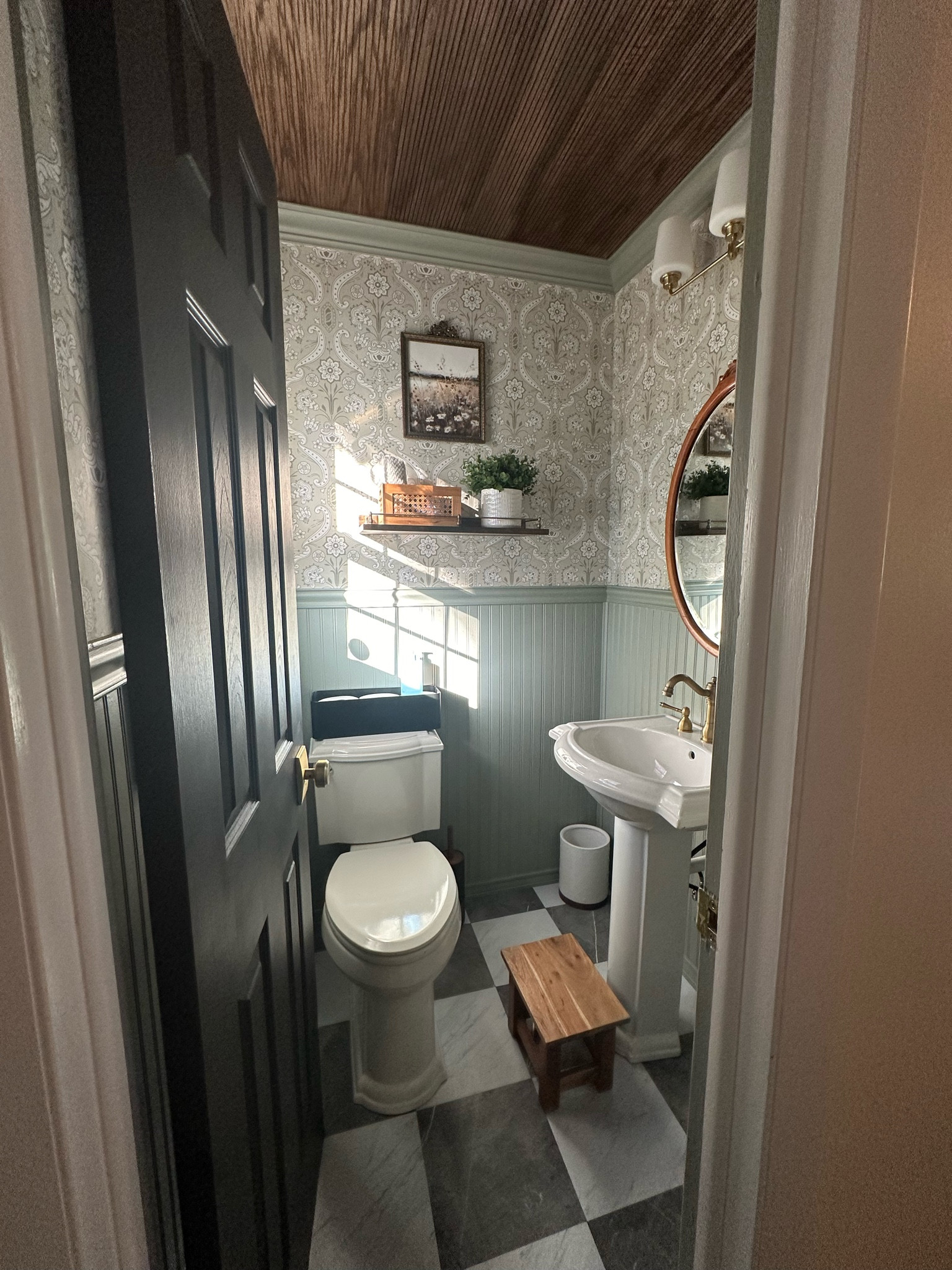  My recent powder bath makeover

Stain color. Minwax dark walnut
Wallpaper: From peel and paper
Wall color: pigeon by farrow and ball 