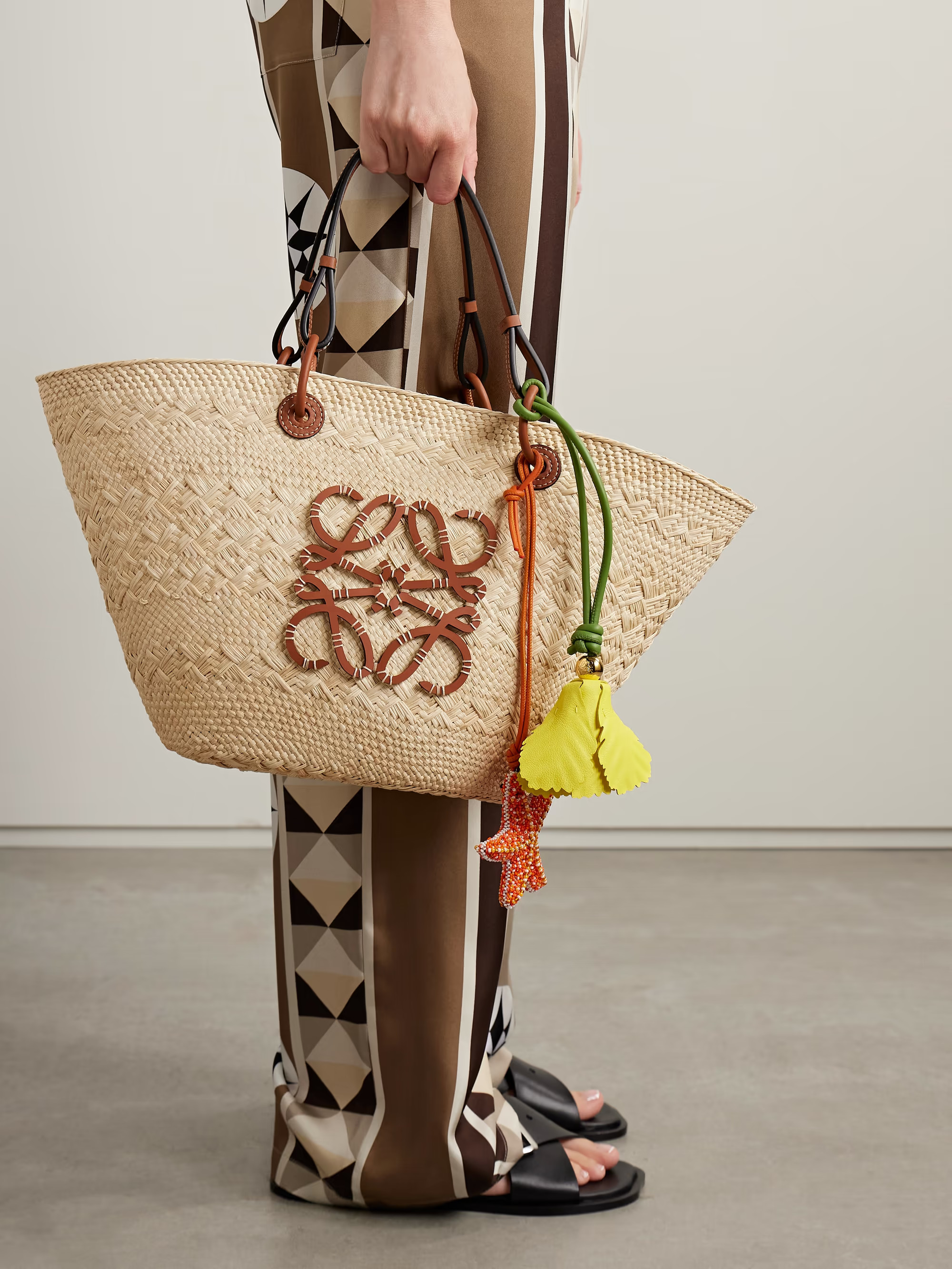 + Paula's Ibiza Anagram medium leather-trimmed woven raffia tote | NET-A-PORTER (US)