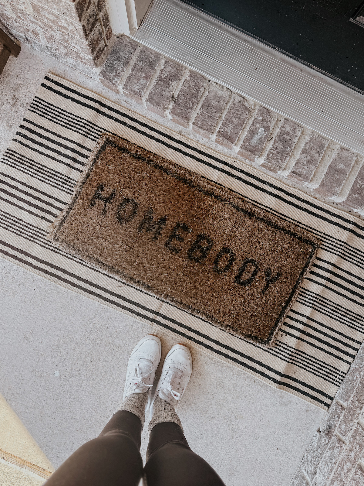 I love adding a large door mat under the regular one to make things a little nicer looking!  

 #LTKSeasonal #LTKHome #LTKFindsUnder50