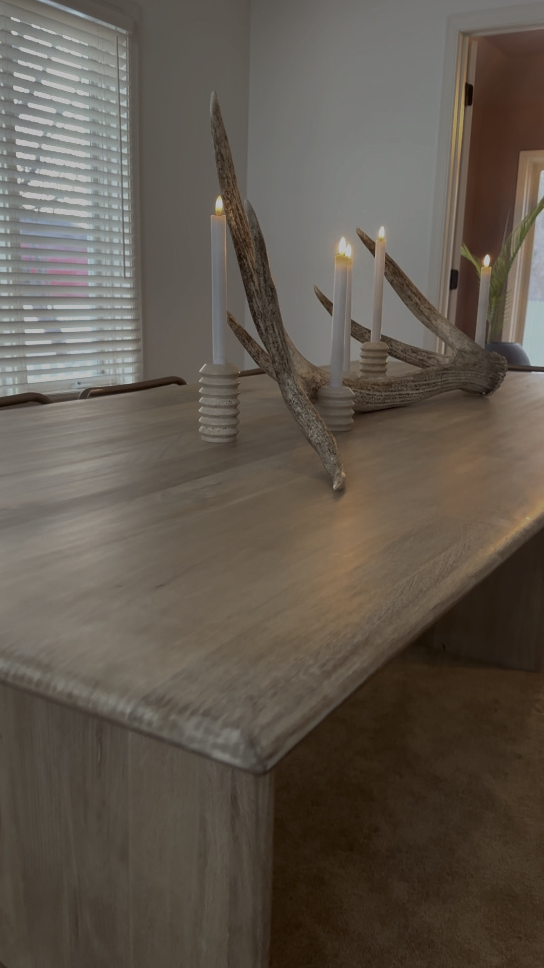 My Anton dining table is here after a 4 month wait! I added marble tapered candle holders with a natural shed elk antler. 

#LTKhome #LTKunder100 #LTKunder50