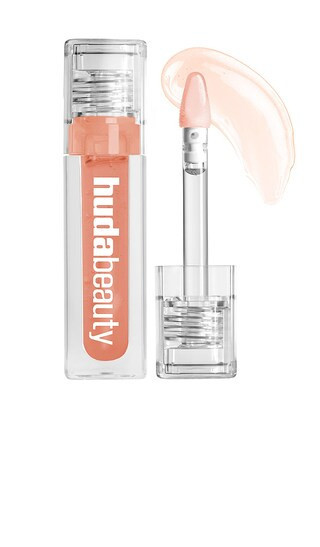 Huda Beauty Faux Filler Oil in Juicy Peach. | Revolve Clothing (Global)