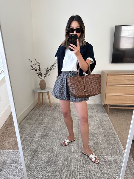 Simple summer outfits. Love these expensive shorts bc they’re so lightweight and breezy. These are old but linked similar. 

Everlane Tee Medium
Doen shirts xs
Jenni Kayne cardigan xs
Hermes Oran sandals 35
Little Liffner tote 
Celine sunglasses 

#LTKshoecrush #LTKSeasonal #LTKitbag