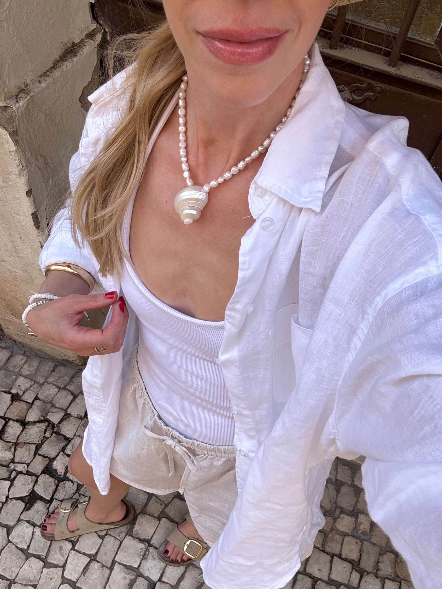 Summer vacation, travel outfit, beach vacation, shell necklace, linen shirt 

#LTKOver40 #LTKTravel #LTKSeasonal