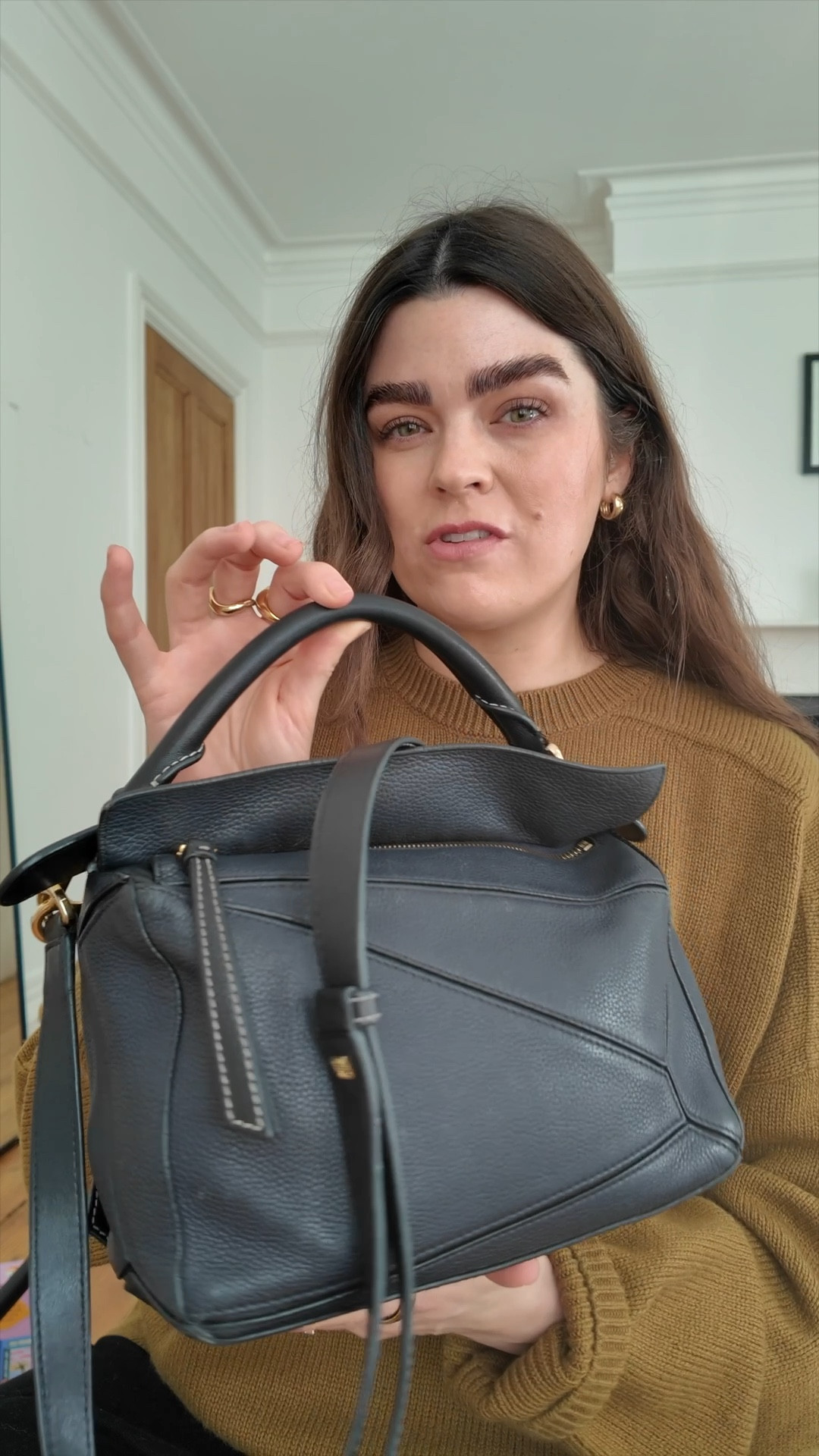 Let’s review my most worn bag EVER…8 years later. My Loewe Puzzle Bag, size small in Midnight Navy

#LTKbag