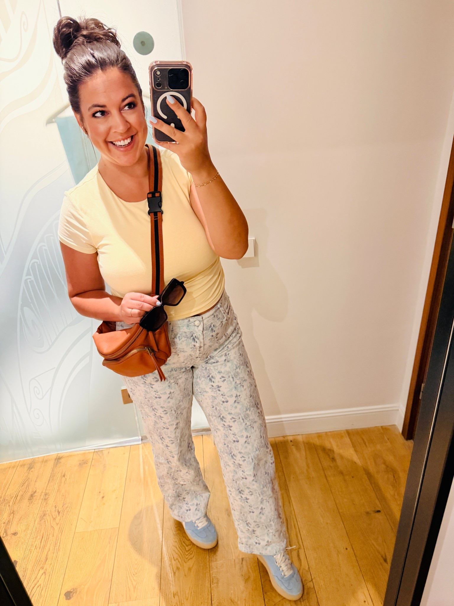 Buttercream yellow t-shirt and floral pants for a day exploring Barcelona. 

#LTKMidsize #LTKootd