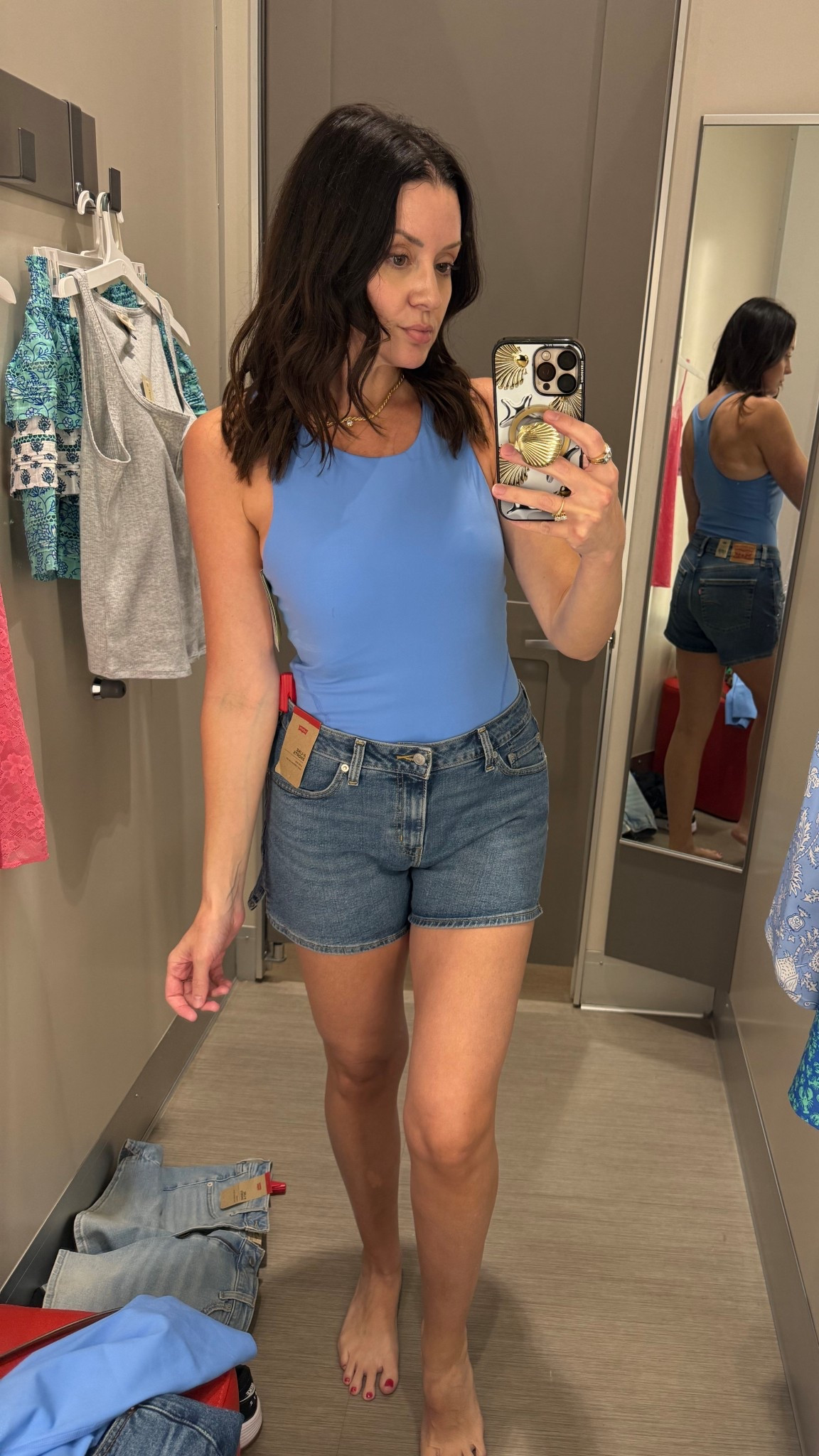 Levi’s A-line shorts & blue workout tank

#LTKfitnessgoals #LTKOver40