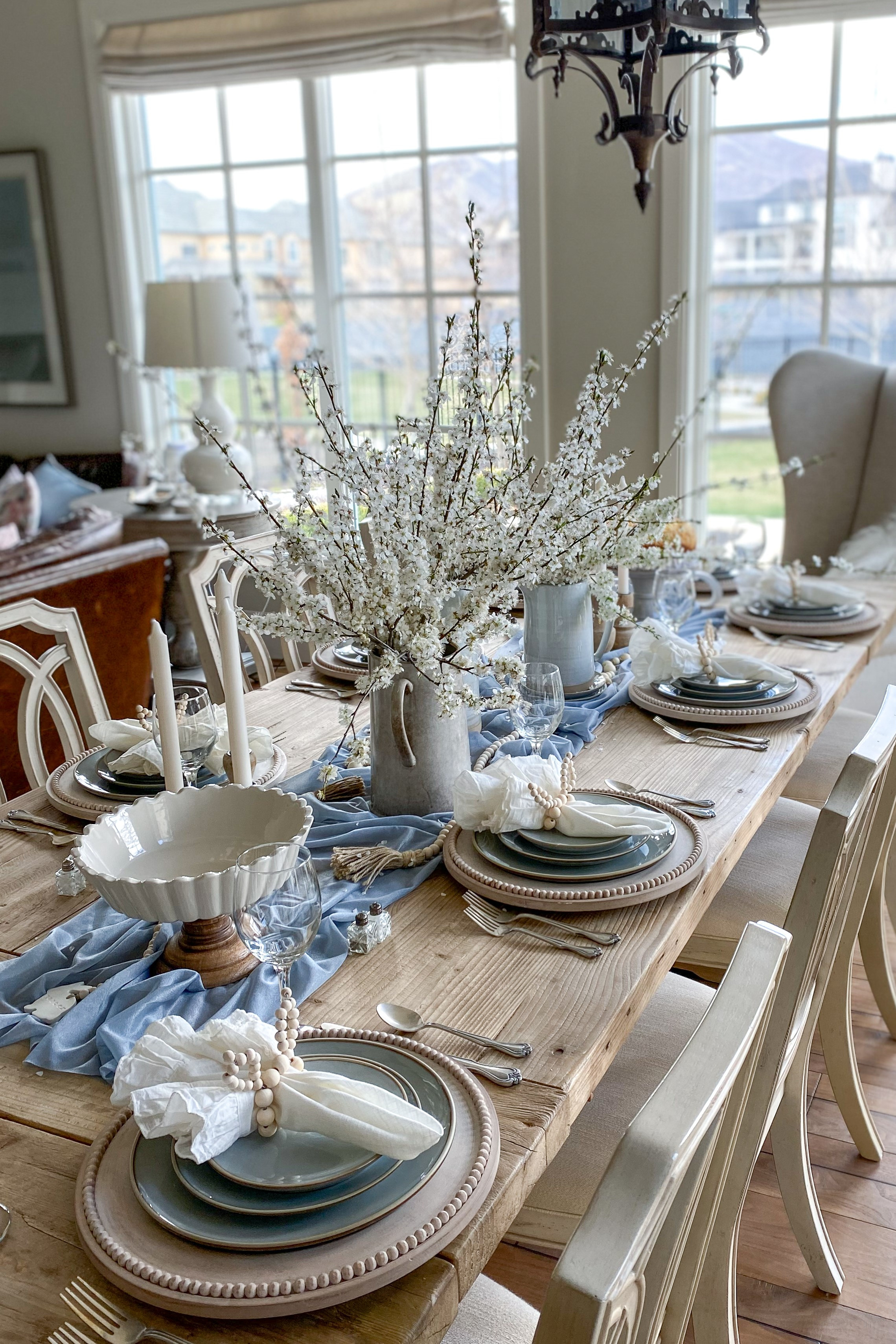Spring table goals 💙🌿
This dusty blue Easter tablescape with mango wood accents is the perfect mix of soft, cozy, and elevated.

Hosting this season? You need this look ✨
Tap to shop + bring this table to life at home 🕊️

#LTKhome #SpringDecor #EasterTablescape #HostingInspo #NeutralHome #TableDecor #CoastalStyle #FarmhouseDecor #HomeStyling #BrunchIdeas 

 #LTKfoodie #LTKSeasonal #LTKHome