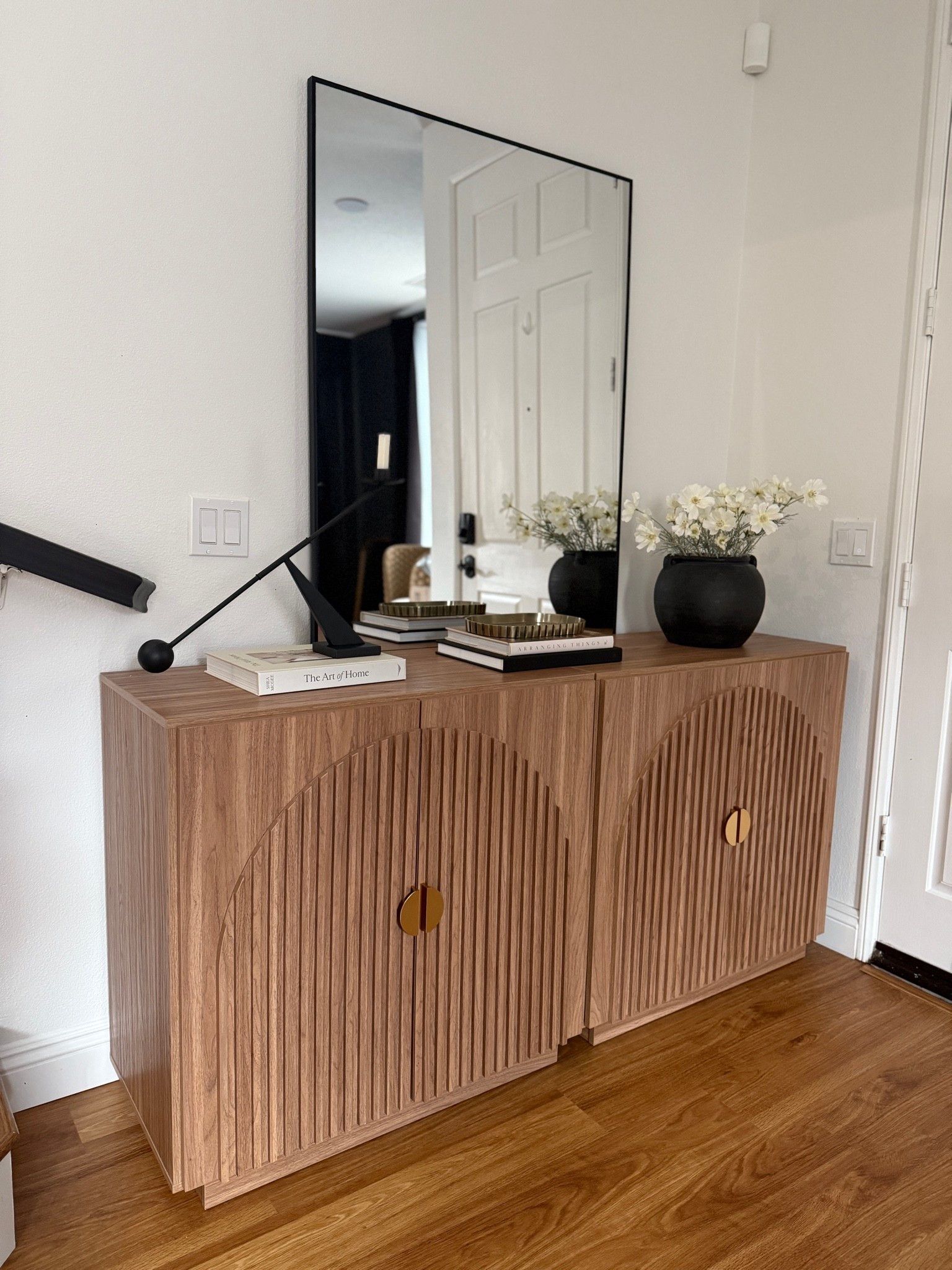 #ad These cabinets are proof that functional storage can still make a serious design statement. 🤎 The warm wood finish, fluted arch detailing, and brass accents give them such an elevated, designer-inspired look.

Shop these cabinets and more furniture finds at @Wayfair to create a high-end home without the high-end price tag. ✨

#wayfair #WayfairPartner

#LTKSaleAlert #LTKHome