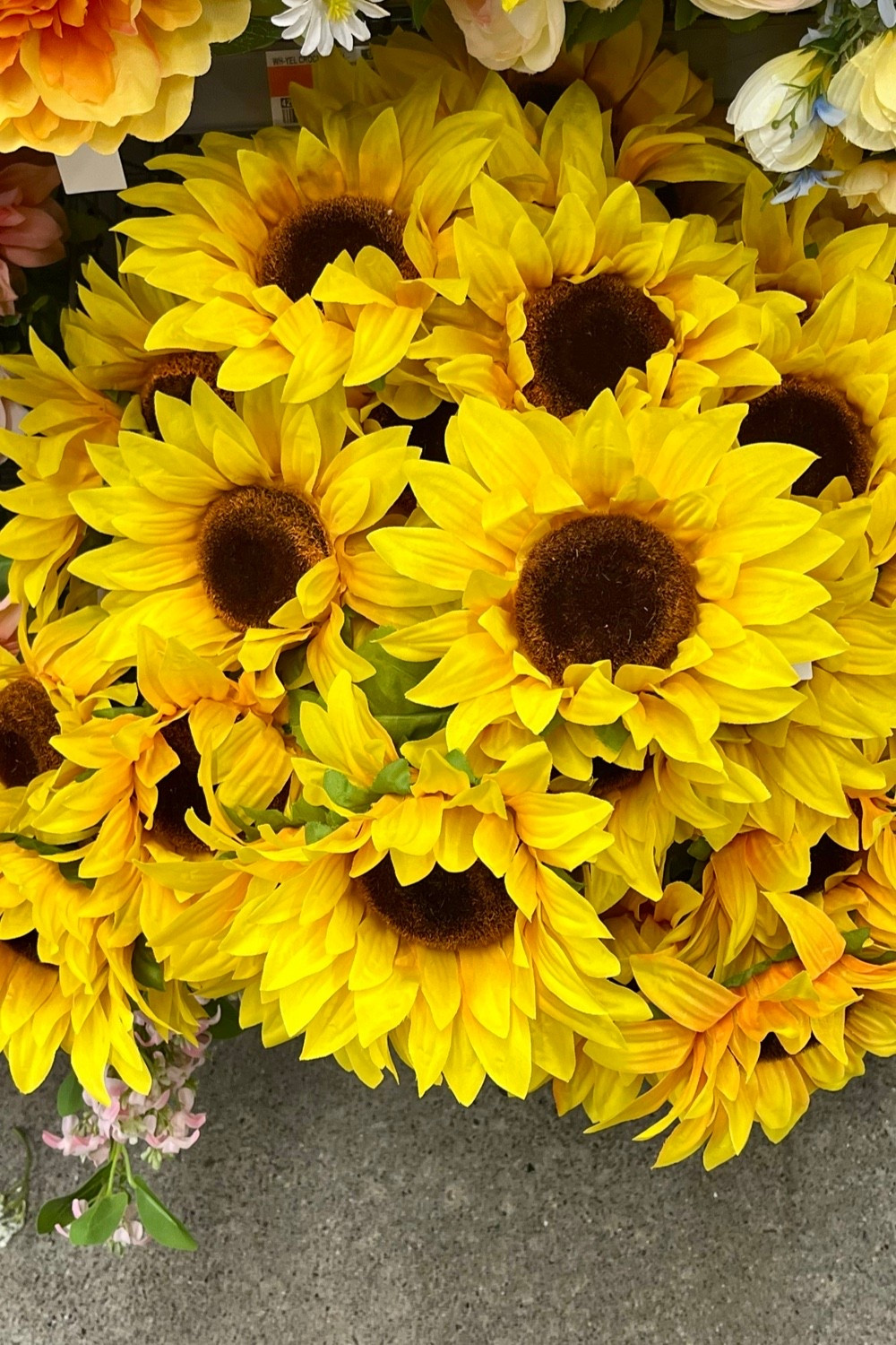Pretty faux sunflowers at Walmart. An inexpensive addition to your late summer/ early fall wedding decor. 

#LTKHome #LTKSeasonal #LTKWedding