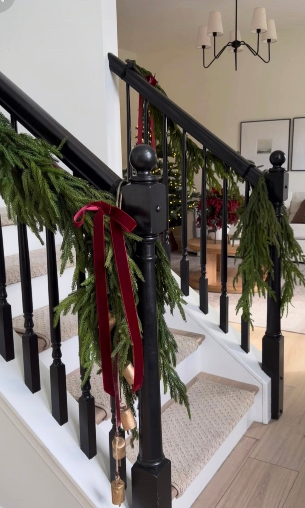 Holiday magic starts before you even walk through the door 🎄✨

Love how a little greenery, ribbon + twinkle lights can completely transform a railing for the season. Linking everything you need to recreate this cozy, elevated holiday look! 🤍

#holidaydecor #christmasdecor #christmasdecorating #holidayhome #christmasinspo #staircasedecor #garland #homedecor

#LTKSeasonal #LTKHome #LTKSaleAlert