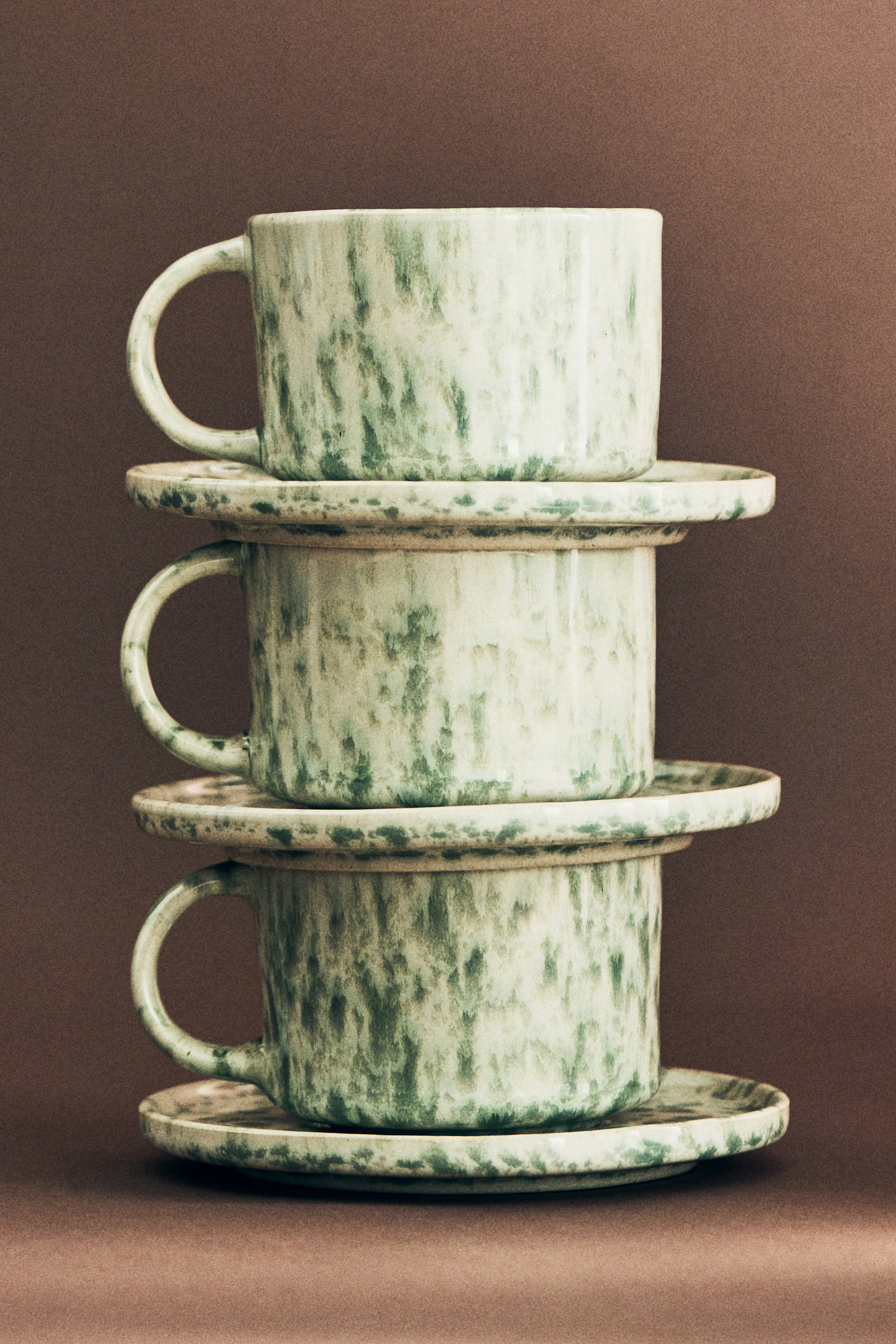 Reactive-glaze mug and saucer | H&M (UK, MY, IN, SG, PH, TW, HK)