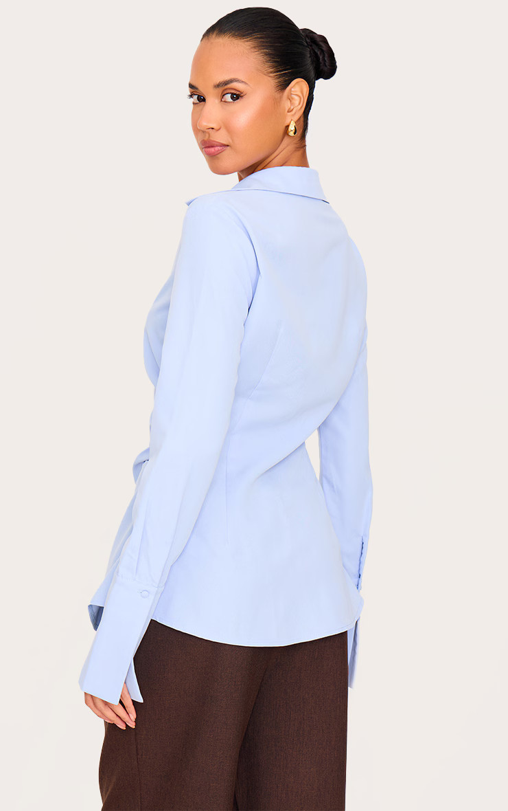 Light Blue Asymmetric Cinched Shirt | Tops | PrettyLittleThing US