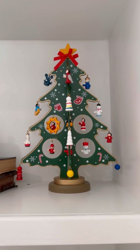 This cute little wooden tree is what I bought on the cruise I went on earlier this year at the sweetest little Christmas shop and I found almost the exact one on Amazon so if you’re interested in having this cutie in your home this holiday season I’ve linked it in this post

#LTKHolidaySale #LTKSeasonal #LTKHoliday