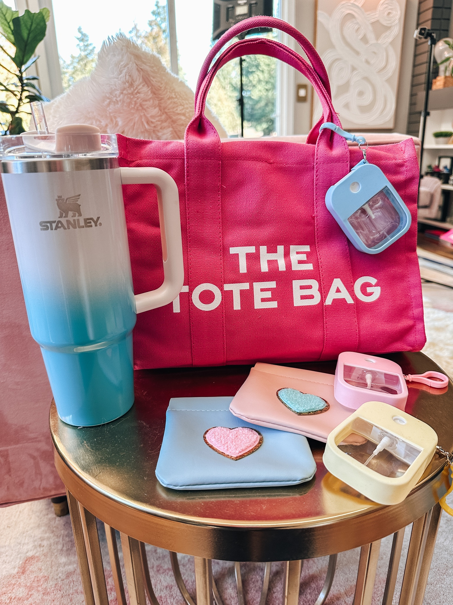 Tote bag 
Refillable hand sanitizer spray
Stanley tumbler
Coin purse 

#LTKitbag #LTKstyletip #LTKunder50