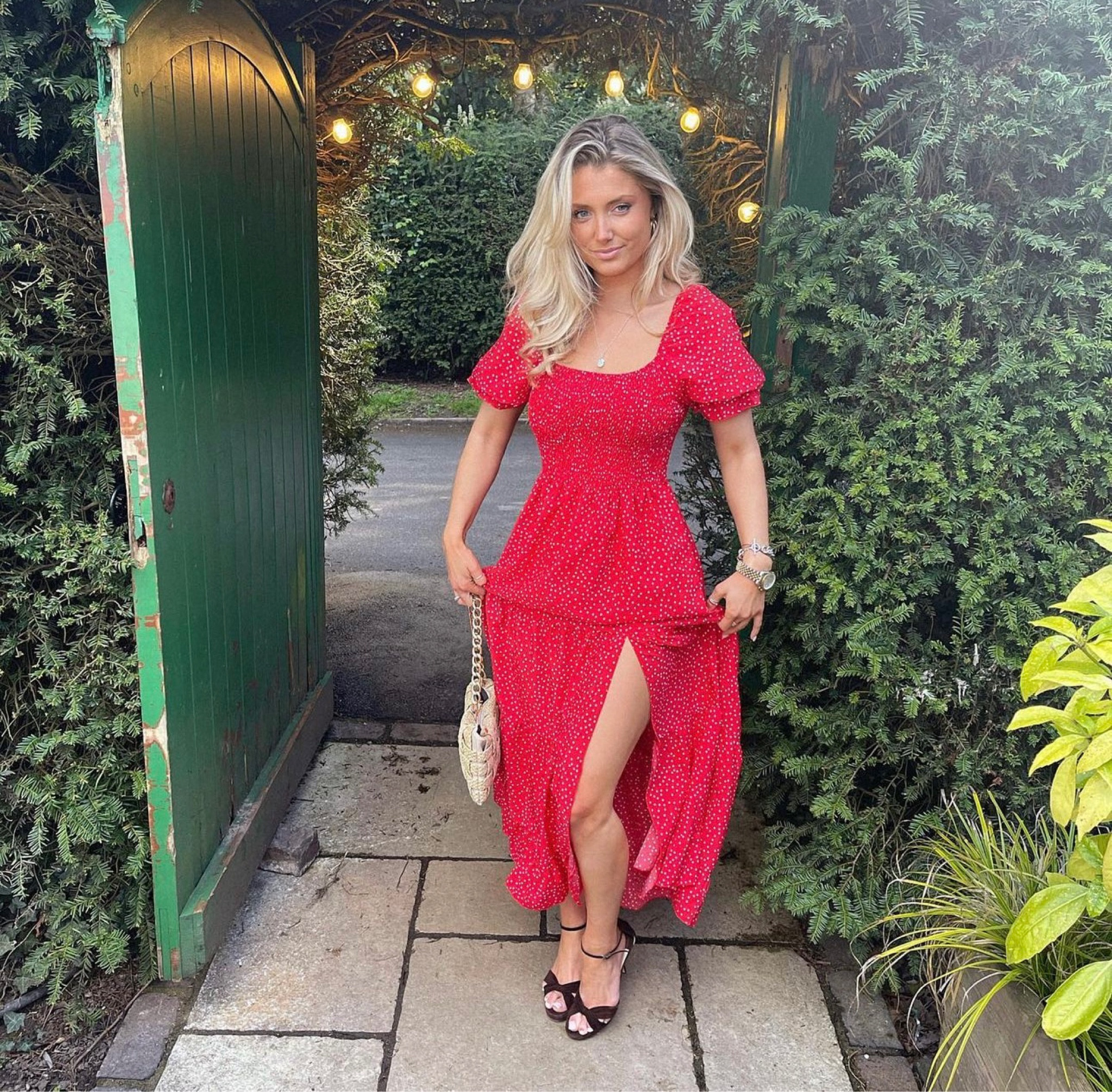 Red polka dot spotty dress slit puff shoulder, black heels, shoulder bag

#LTKSeasonal #LTKstyletip #LTKeurope