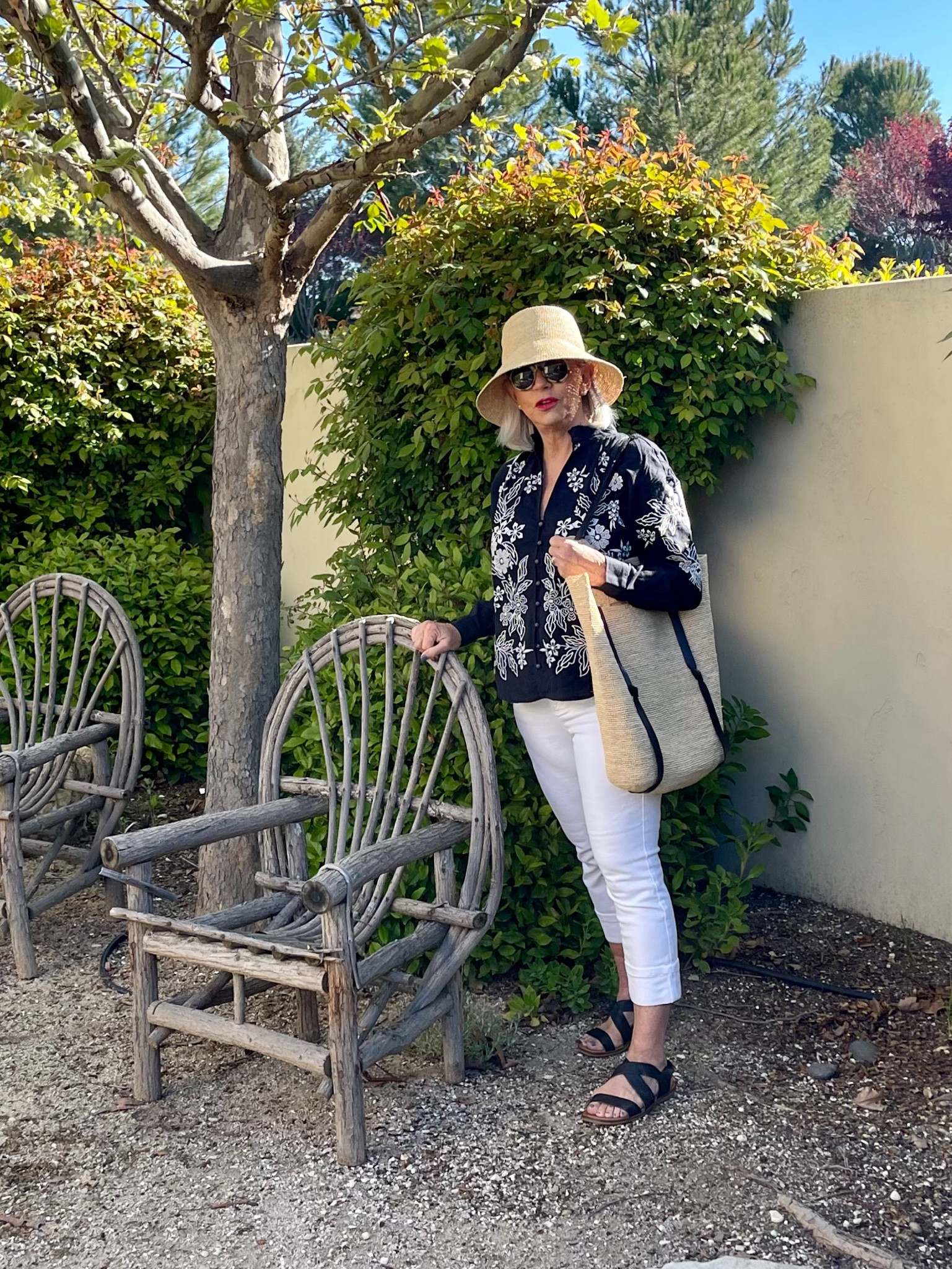 Anthropologie embroidered top white jeans summer straw hat and bag

#strawbag #over50style #whitejeans

#LTKstyletip #LTKSeasonal