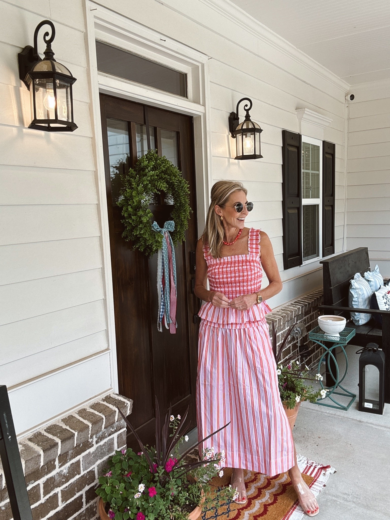 Another look for less this top is only $22. It comes in two colors and both have a matching skirt that is also less than $30. So perfect for you next summer vacation or event.