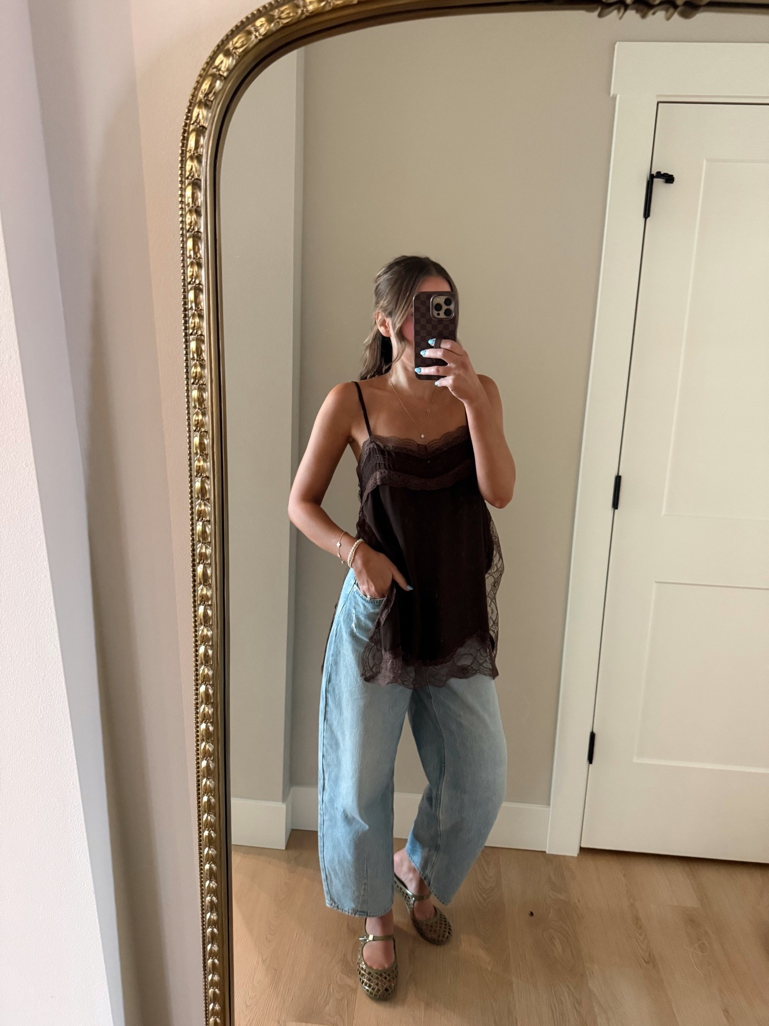 Amazon tank and Target denim. Wearing a small top and size 2 barrel jeans 

Amazon finds, target style, brown tank, jelly flats outfit
