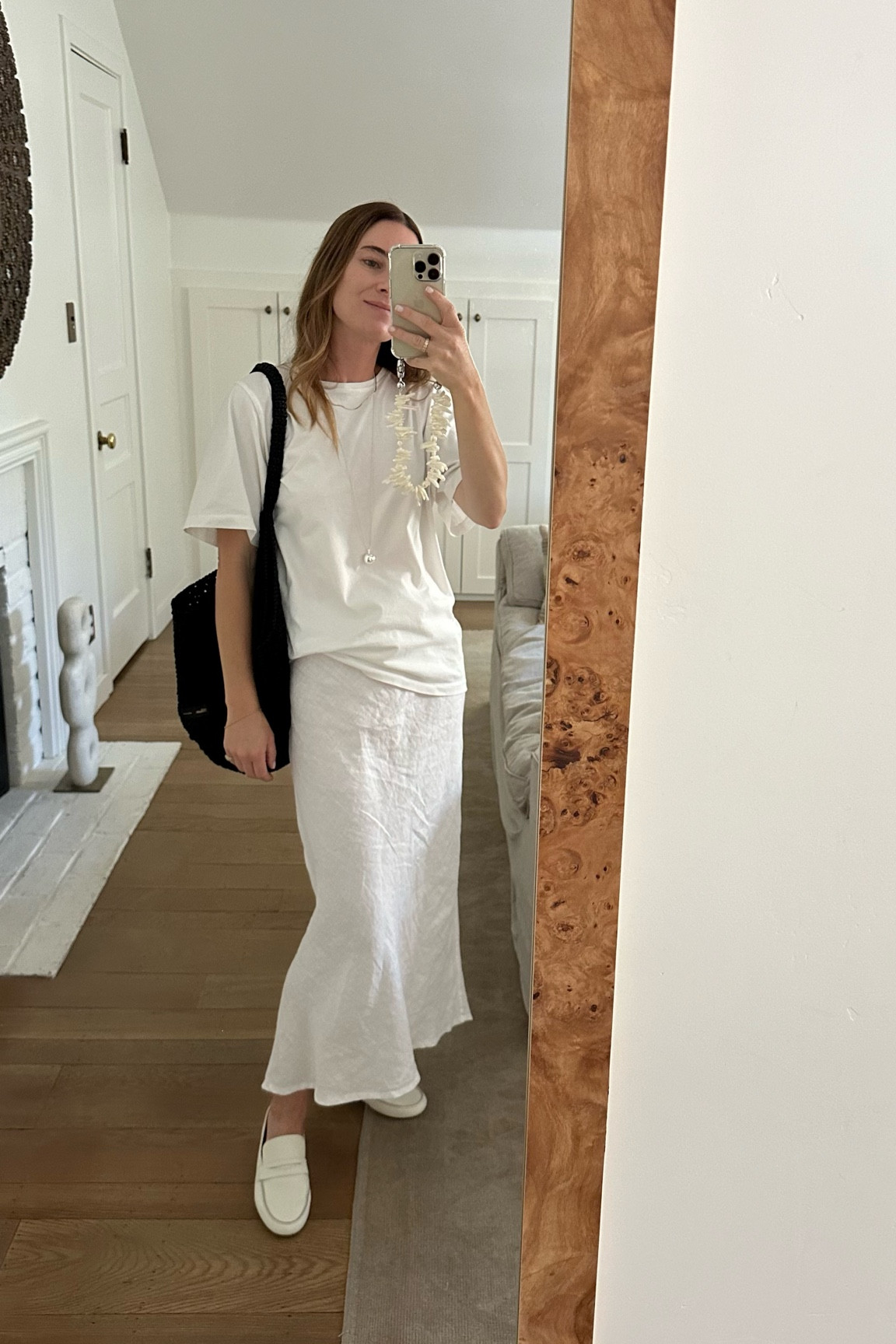 Another day in this skirt — was feeling a more oversized shirt and always pull for this Toteme one. I’ve had it for a few years now and it washes up great! Worth the splurge for a nice tee in my book. (I sized down) 

#LTKSeasonal