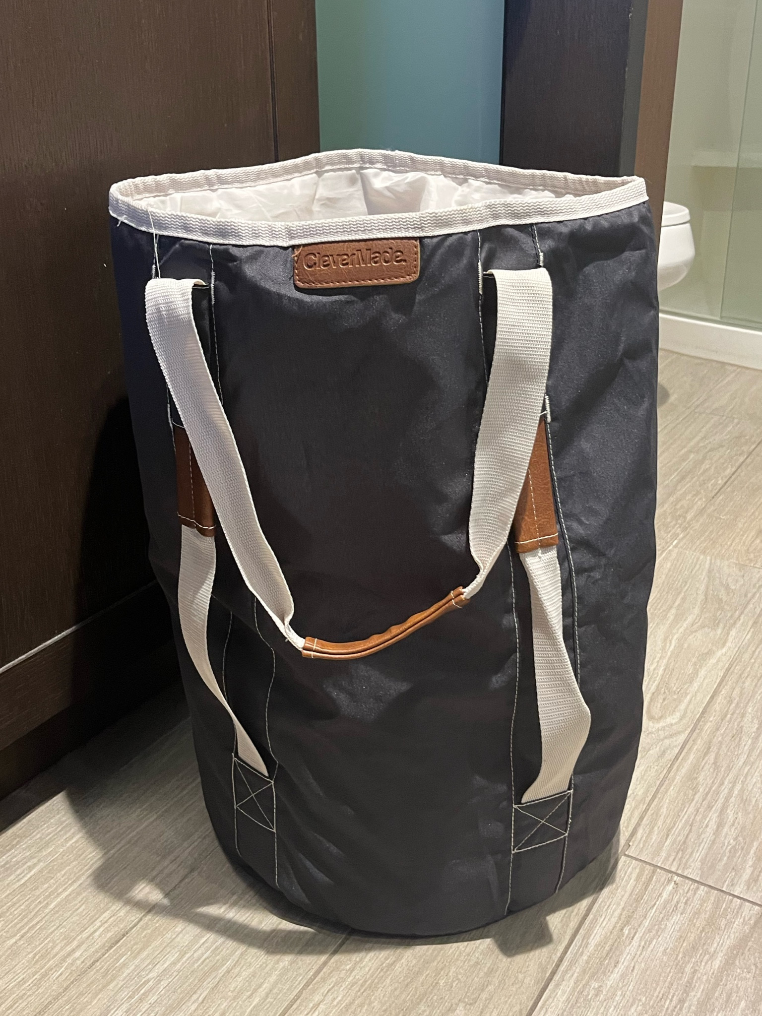 Travel laundry bag.  So civilized.   Great for a family.   Closes up for easy packing.  Can be carried or worn as back pack for dorm life/ college kids.   Love it. 