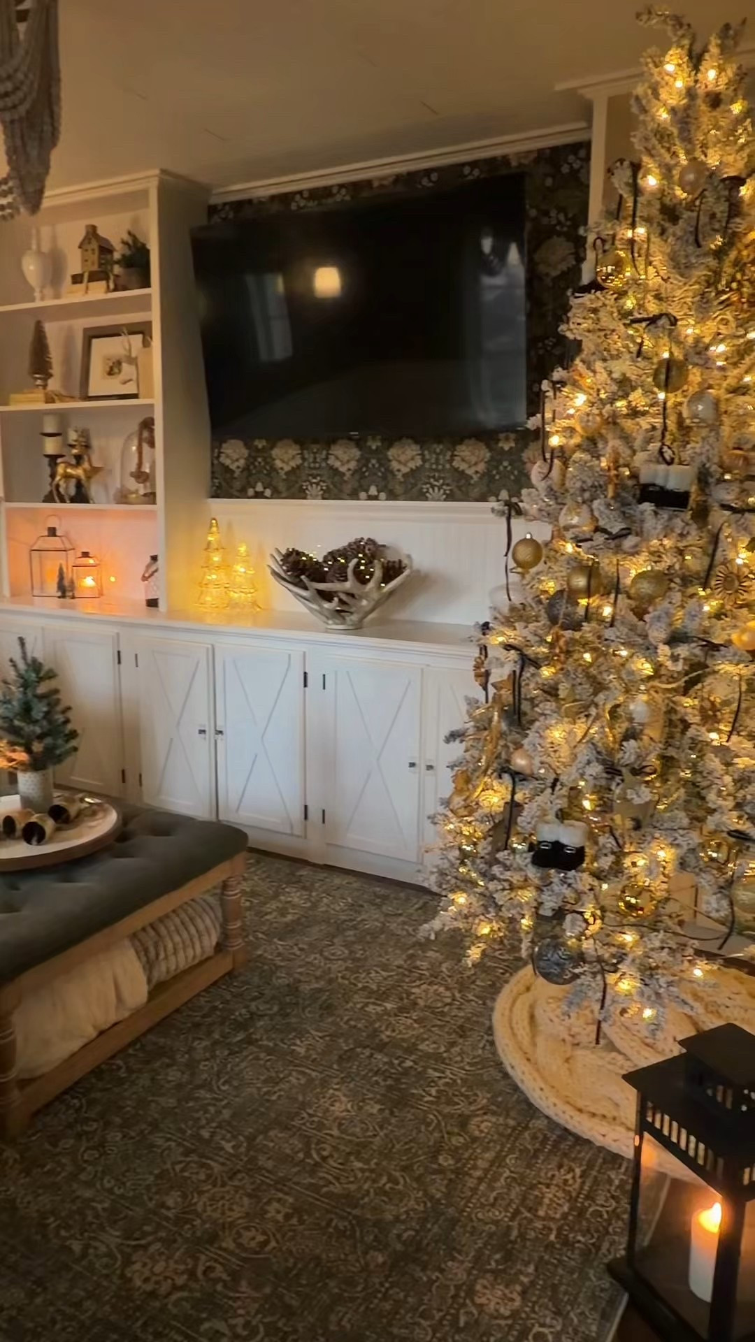 Cozy Christmas nights in the media room ✨
Sharing the most-asked-about pieces because this space always gets so many questions—especially the rug, the peel-and-stick wallpaper, the cordless rechargeable sconces, and of course our little Christmas tree tucked by the sofa.

The wallpaper is renter-friendly, the sconces turn on with a remote (game-changer), and the rug brings the whole moody palette together. Linked everything below so you can recreate the vibe in your own home. 🖤🎄

Shop the room:
🛒 Rug
🛒 Peel & stick wallpaper
🛒 Cordless rechargeable sconces + remote
🛒 Christmas tree
🛒 Christmas decorrations

#LTKSeasonal #LTKHome #LTKHoliday