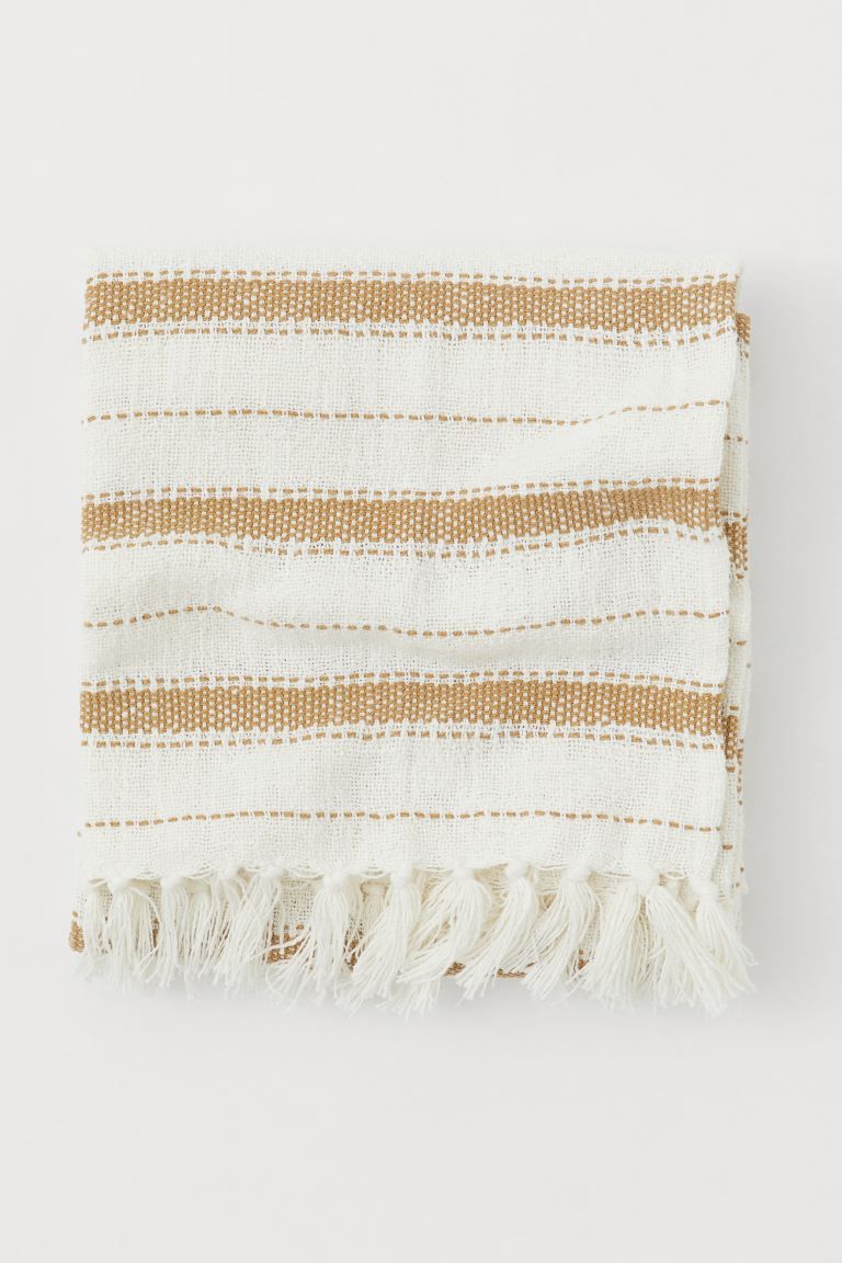 Striped throw in a soft, woven cotton blend. Fringe at short sides. | H&M (US + CA)