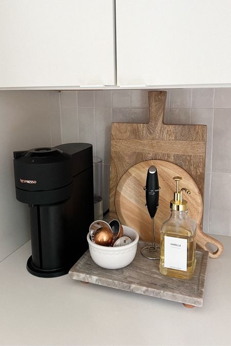 updated the coffee corner of our kitchen and I love how simple and beautiful it looks! This riser is everything! #coffeebar #coffeecorner #coffee #coffeelover #coffeesnob #nespresso #charcuterieboard #woodenboard #cuttingboard #coffeesyrup #dispenser 

#LTKhome #LTKSpringSale #LTKsalealert