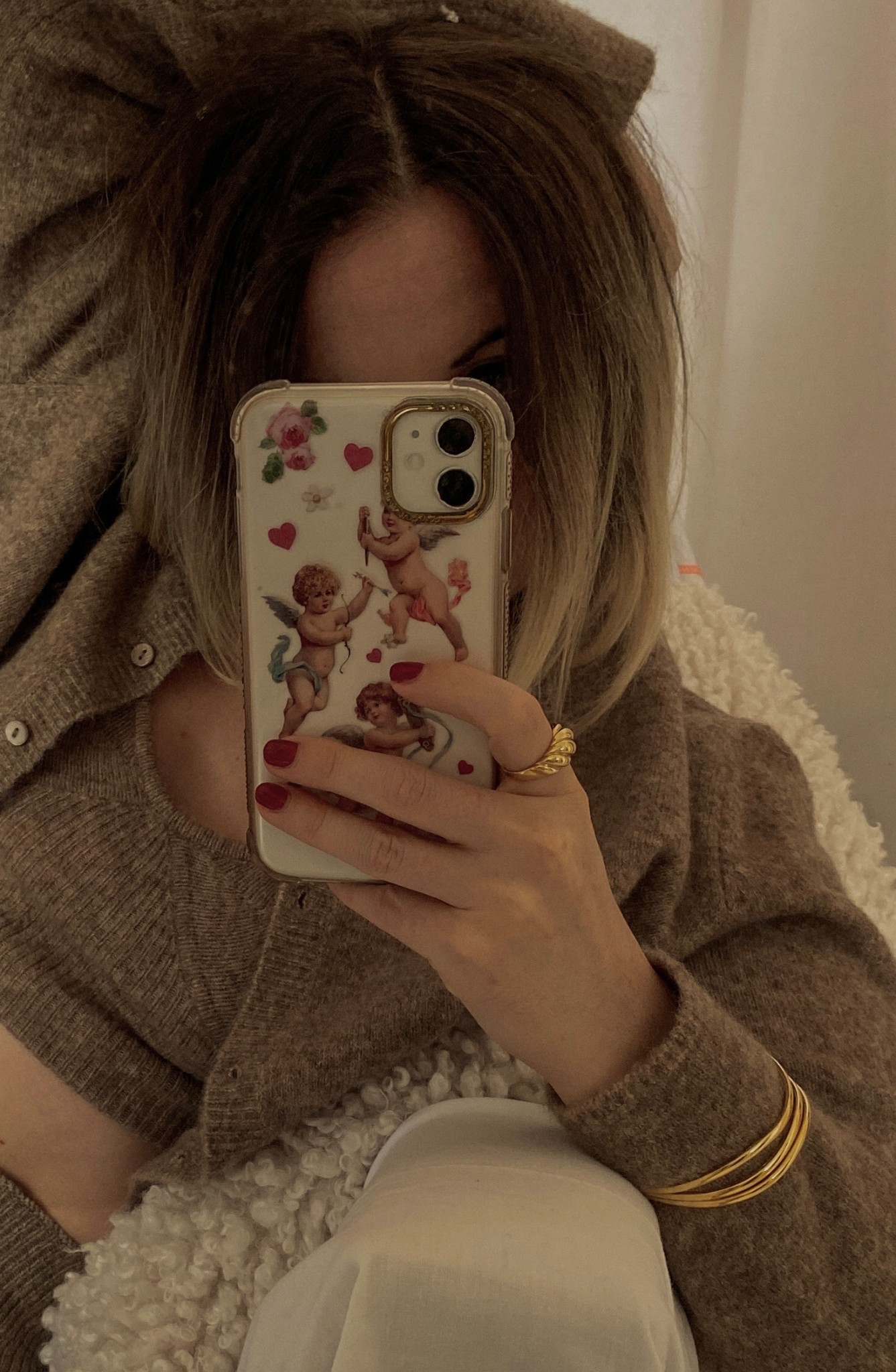 Knit happens… but a little gold always saves the day ✨ stacking bangles + croissant ring for autumn polish.
.
croissant ring | gold stacking bangles | gold jewellery | bracelet stack | autumn outfit | cosy coord | autumn jewellery | everyday gold jewellery | jewellery layering | fall fashion | jewellery edit | chic accessories | LTK jewellery | cardigan | Skinnydip cherub phone case 

#LTKgiftguide #LTKluxury #LTKstyletip