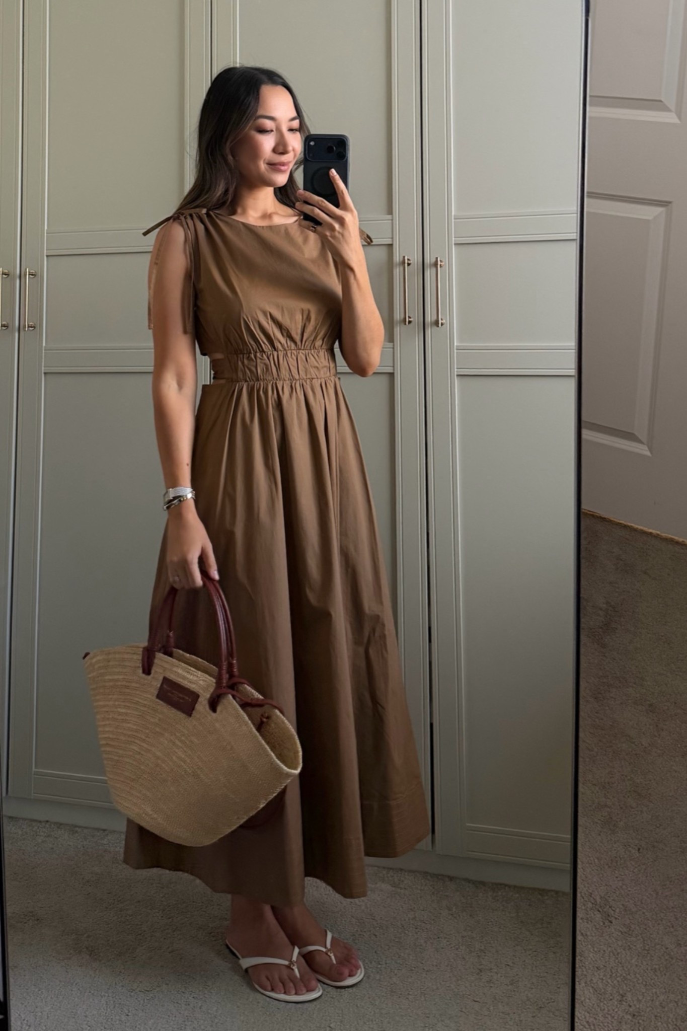 Modest summer dress that can be dressed up or down! Love the detailing of the ties and cutout