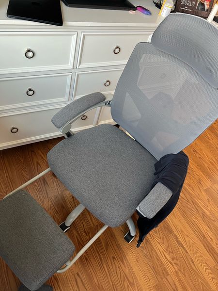 We love this chair for work and for relaxing.  Foot rest comes out and tucks back under easily.  Back adjusts so you can lean back or work on your posture. #remote #office 

#LTKSpringSale #LTKfindsunder100 #LTKsalealert