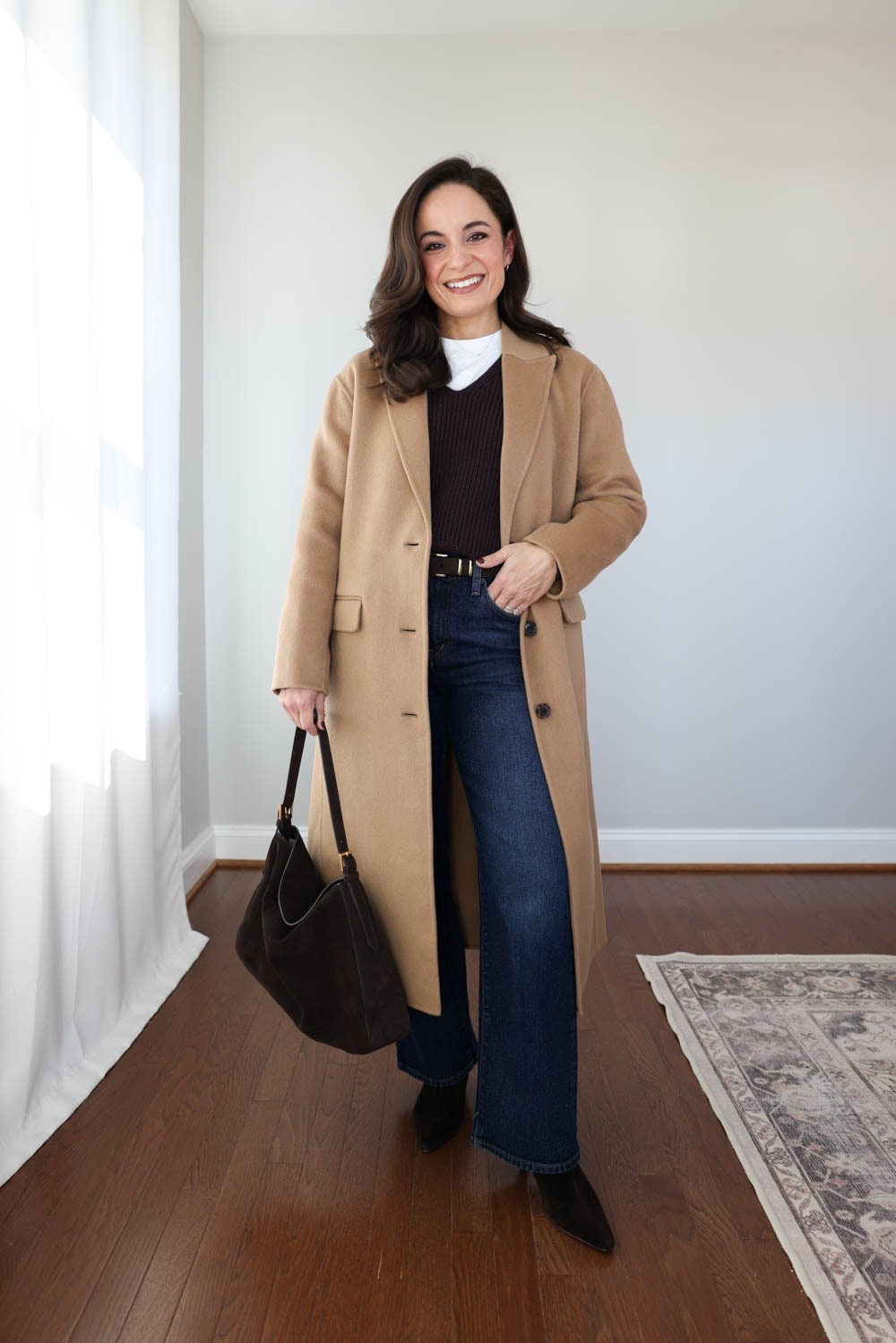 Three tailored topcoats for petites!

Chiara Topcoat (J.Crew): petite 00 - oversized 
Brown sweater (Quince): xs - oversized 
White t-shirt (Old Navy): petite xs 
Jeans (Madewell): petite 24 / 10 3/8” rise / 28” inseam 
Boots (Dolce Vita): true to size 

For size comparison, I’m 4’10” 105lbs. My measurements are 32”, 24”, 36”. I typically wear petite xxs/00/24 and have a 25” ankle inseam and a 27.5-28” full length inseam.