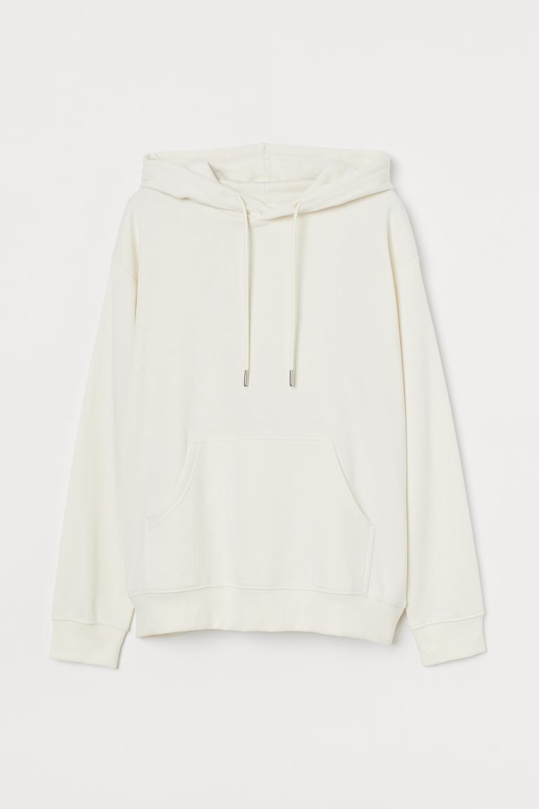 Wide-cut sweatshirt with a lined drawstring hood, kangaroo pocket, and ribbing at cuffs and hem. | H&M (US + CA)