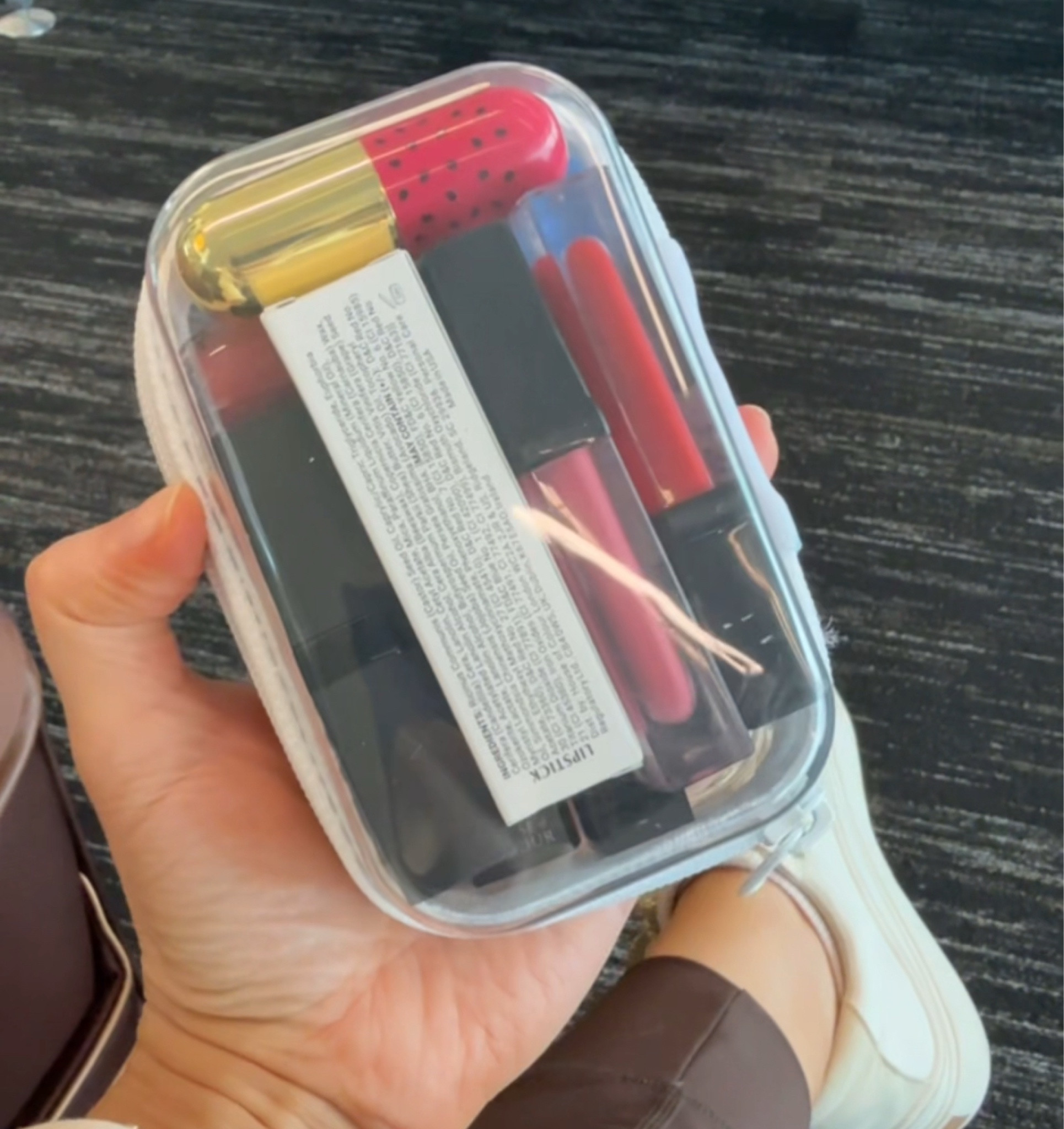 This hard case is perfect for keeping all my lipsticks organized. Using the second for cords. This is the extra small size  