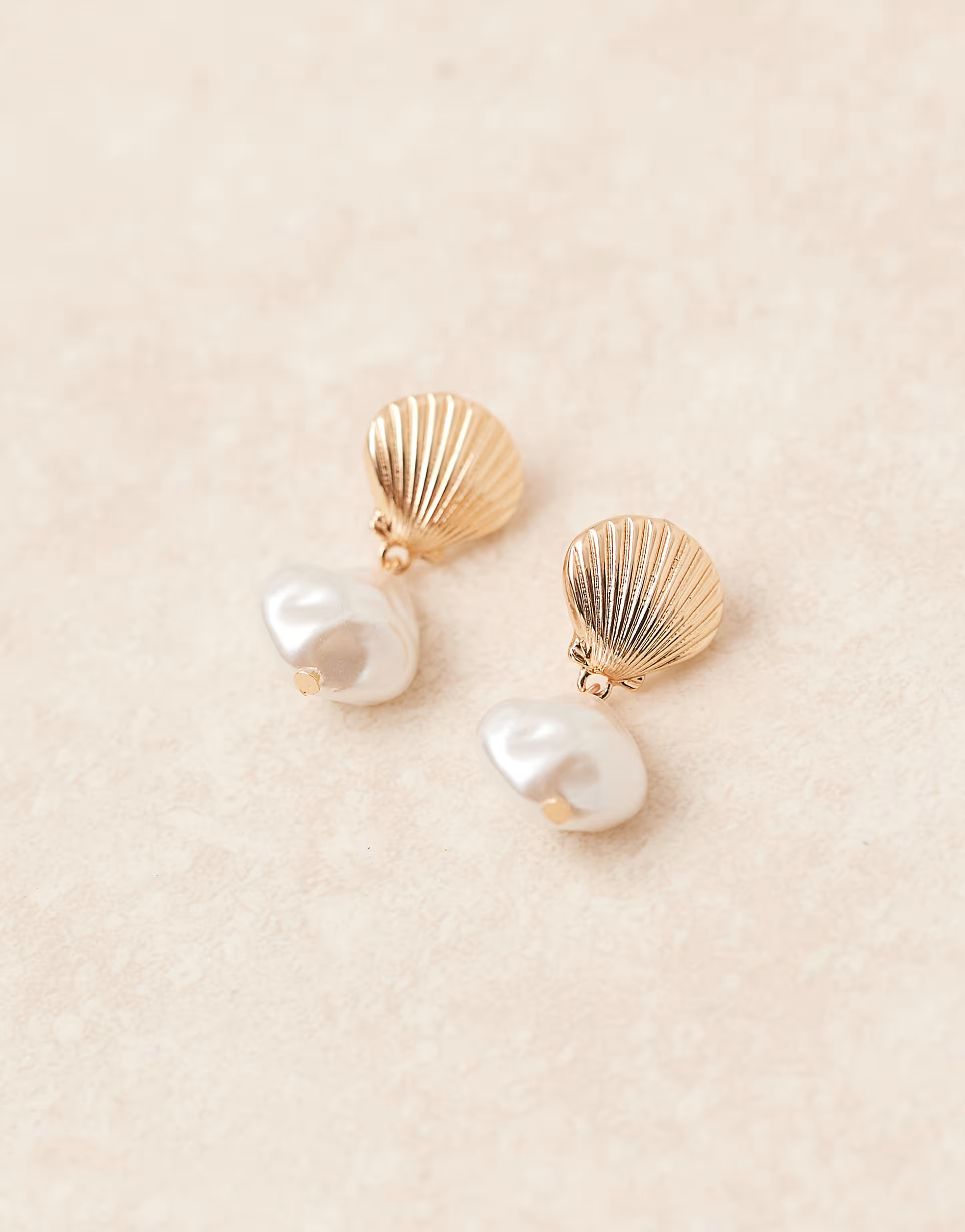 ASOS DESIGN stud earrings in shell design with faux pearl in gold tone | ASOS | ASOS (Global)