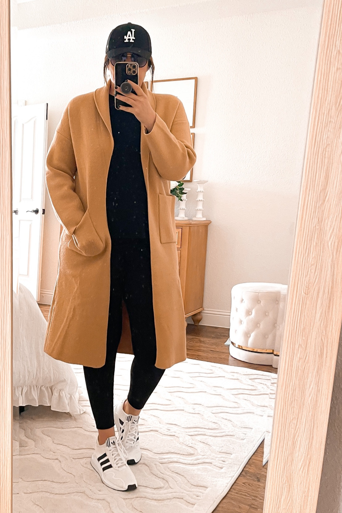 Loving this long cardigan from pink lily .. wearing size large 
Fallout, winter outfit, travel outfit, cardigan, sweater, leggings, sneakers, ball cap

#LTKsalealert #LTKSeasonal #LTKunder100