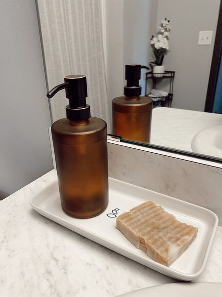 Bathroom essentials, soap dispenser, vanity decor, shower curtain. 

#LTKhome #LTKunder50