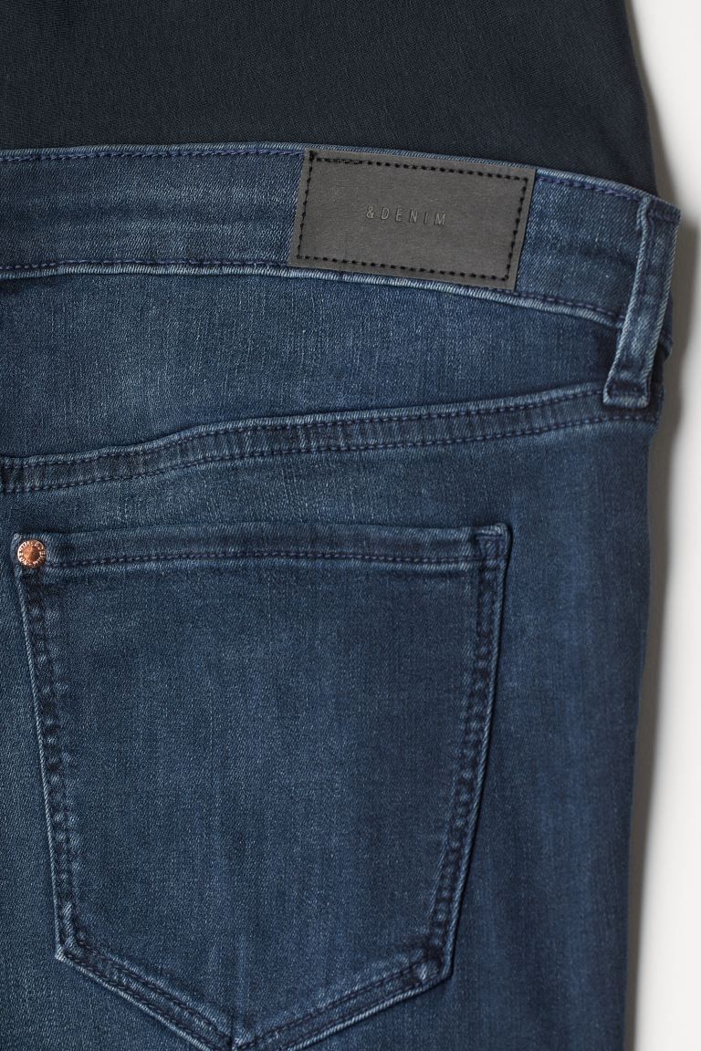 Jeans in washed stretch denim. Mock front pockets, regular back pockets, and skinny legs. Wide ri... | H&M (US)