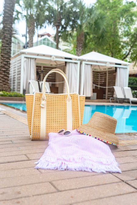 Poolside vacation essentials 🌴☀️ This cane tote bag is waterproof & I love this new striped beach towel. This sun hat has become a fast favorite too! 💕

#LTKitbag #LTKswim #LTKtravel