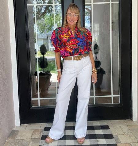 Spring outfit idea featuring white denim. Love this crisp and colorful top. Still available in a few sizes. I’m wearing a medium.

#LTKstyletip #LTKover40