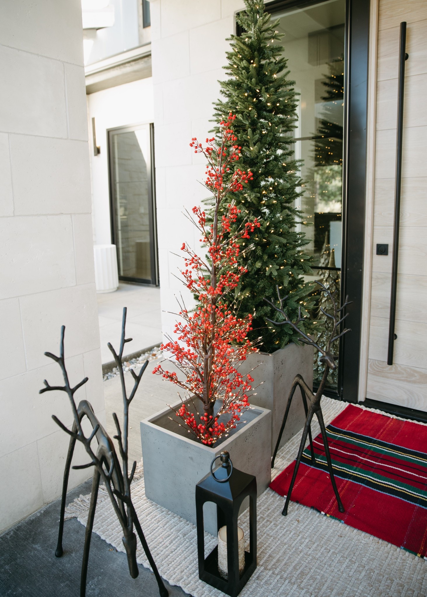 The Lit Twinkling Twig Berry Trees are so cute! Most of these pieces are from Pottery Barn. All linked below. Christmas front porch.

#LTKSeasonal #LTKHome #LTKHoliday