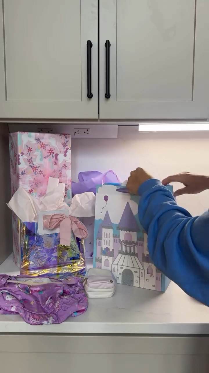 ✨if you love this video, tap follow and be sure to leave a comment for direct links or shop in the LTK app ◡̈ 

birthday traditions listed ⬇️ 

we are almost done with mulheren celebration szn, 4 down and 1 to go at the end of september. birthdays and holidays and just celebrating is my absolute FAVE, can you tell what my love language is? 🎁 

this is our first year in our new home so i have switched from completely decking out their doors to  decorating them and decking out the island. i love traditions and our girls always look forward to their bday signs and and their special theme. 

party or not here are things we do for every birthday⬇️
-birthday banner on door, decorate with balloons 
-new outfit to wear on bday
-pick a theme for their birthday
-decorate island, add gifts and their special cake 
-wake up to surprise, or this year bc liv + reagan are in school i am saving the big island surprise for after school
-yes day with just mom and dad on or around their birthday 
-lastly we pick a special card and joe and i each write in it, we put $20 in it and save it. we will give them all 18 on their 18th birthday 🥹

I can’t wait until livvybug gets home today 😍