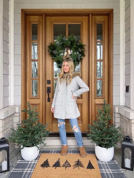 Christmas front door decor!! This is my porch from last year, but linked some new items!! I layered a festive doormat over a 3x5 outdoor rug!! Also sharing my favorite winter jacket and ultra mini uggs.

(12/3)

#LTKhome #LTKHoliday #LTKSeasonal