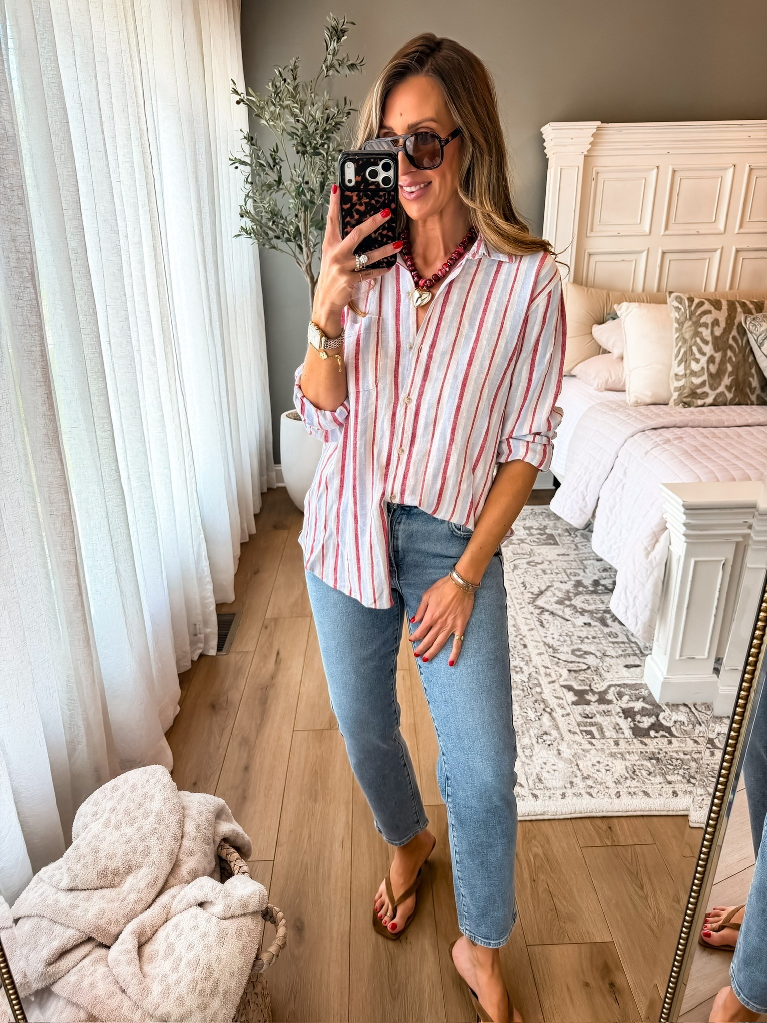 This red striped button down is one of those effortless throw on pieces that makes a simple outfit look styled. I love it paired with denim and sandals for an easy summer look that works for errands, travel days, lunch plans, and everything in between.

striped button down, summer outfit ideas, casual everyday style, classic wardrobe staples, effortless outfits, lightweight tops, denim outfit ideas, vacation style, elevated basics, everyday fashion, themominstyle

#LTKootd #LTKSeasonal #LTKOver40