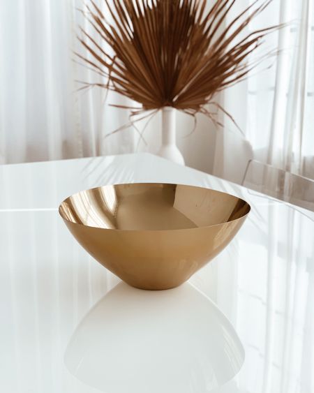 My Bennett gold serving bowl from cb2 is on sale!! I absolutely love this piece. Description from website below 

Polished stainless steel serving bowl is tinted with a shiny gold lacquer. Perfect for adding a luxe metallic layer to your table setting. Ideal for salads, avoid hot foods. CB2 exclusive.

Bennett Gold Serving Bowl 11"Wx10.75"Dx4.75"H
100% stainless steel
Gold lacquer finish
135 oz
Avoid hot foods
Hand wash only; no abrasive cleaners
Made in India

#LTKFind #LTKsalealert #LTKhome