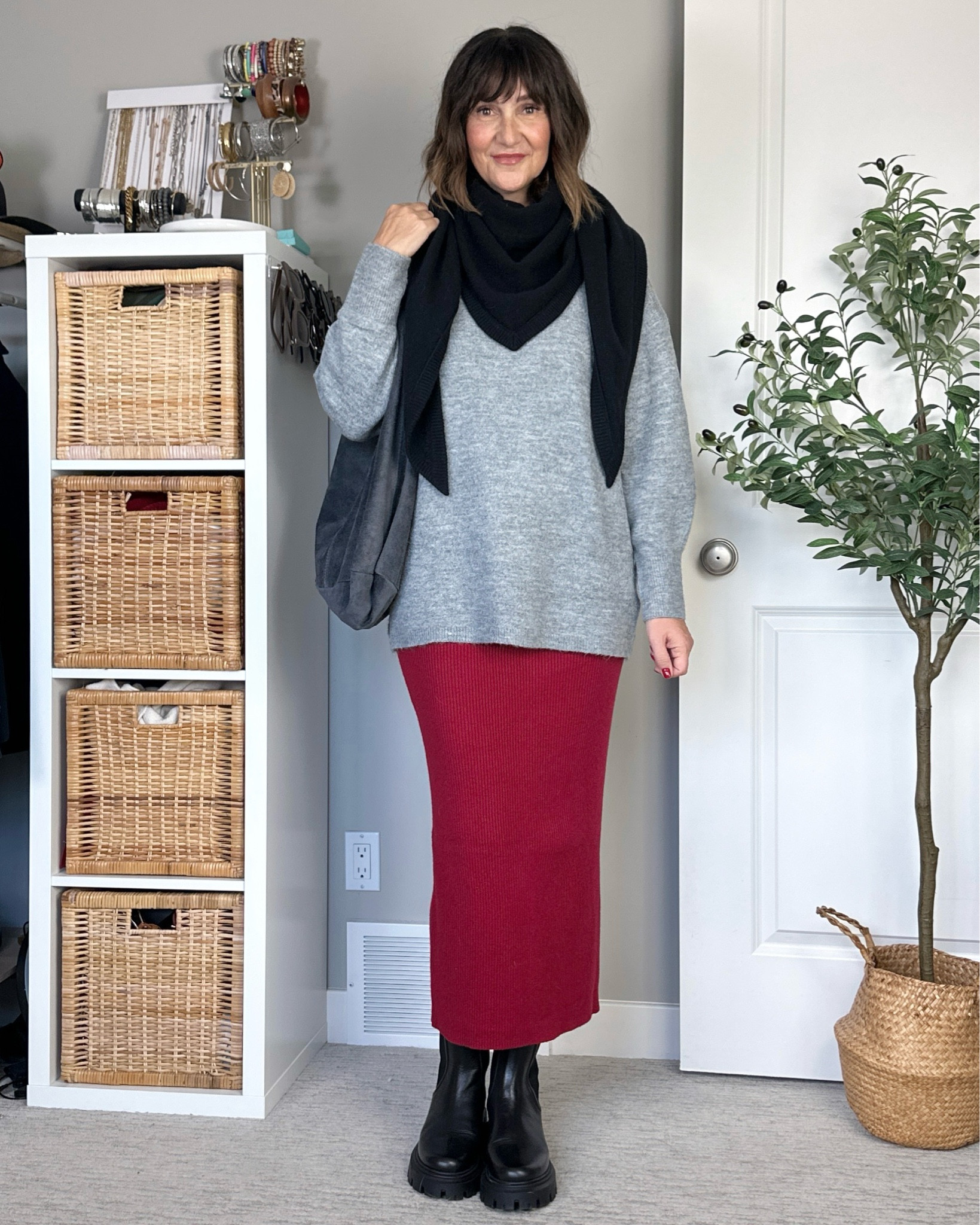 Loving a knit midi skirt, makes the outfit feel more elevated but it’s so comfortable!
I’m 5’ 7” wearing my usual size S in the sweater and skirt.
My cashmere scarf is a splurge but so soft and can be worn the other way which looks similar to a sweater over the shoulders. My suede bag is real suede but affordable and comes in a few other colors.
My boots are from last year but I linked several similar boots. 


#LTKItBag #LTKStyleTip #LTKShoeCrush