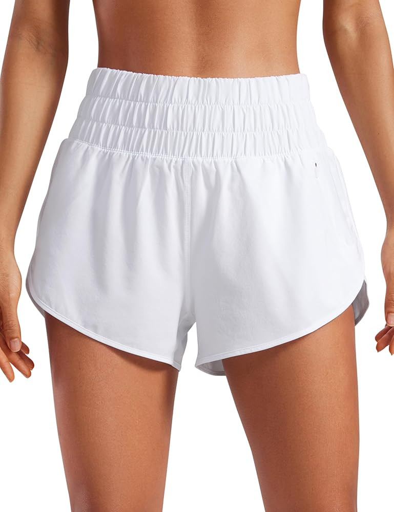 CRZ YOGA High Waisted Dolphin Running Shorts for Womens Mesh Liner Gym Workout Athletic Shorts wi... | Amazon (US)