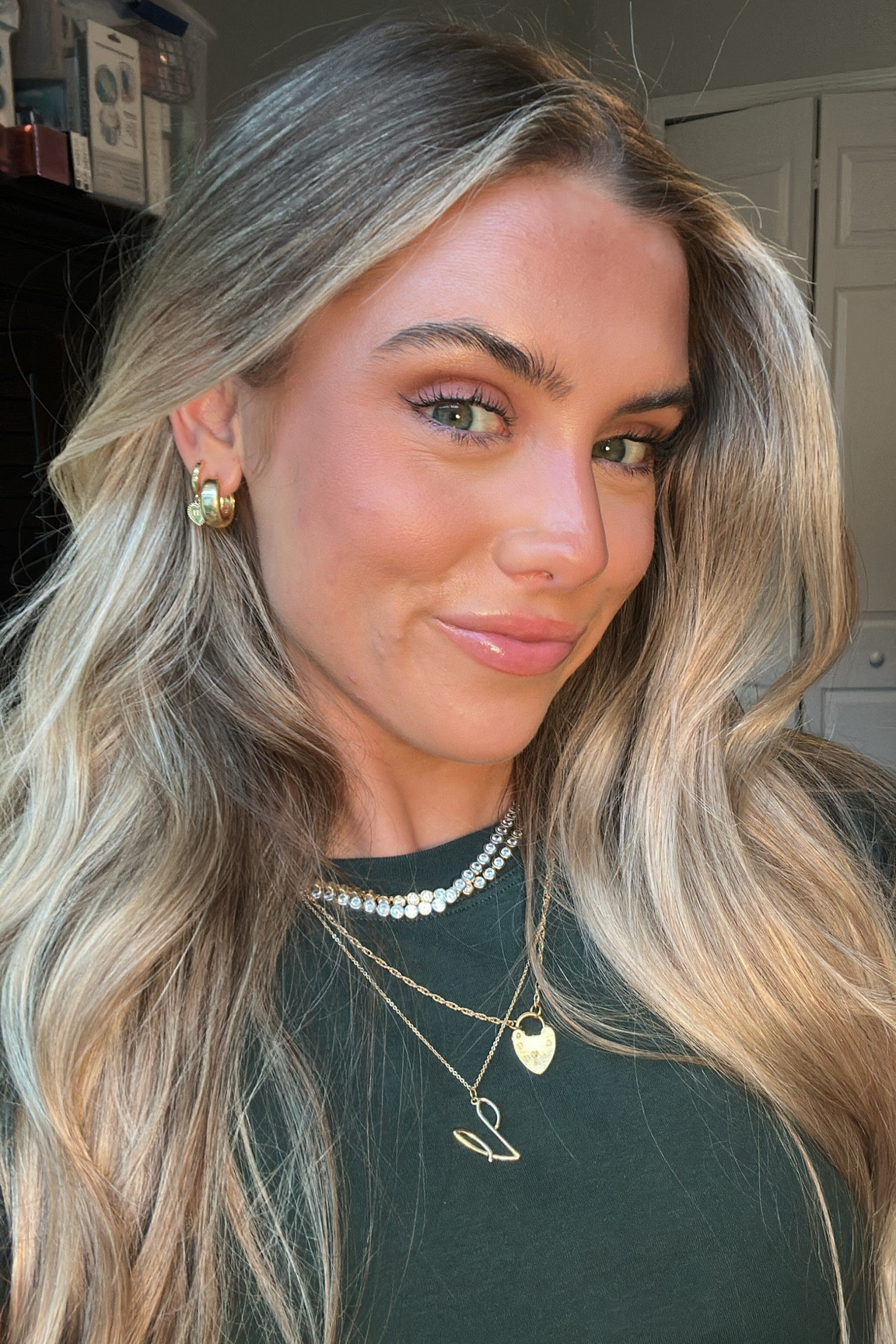 CURRENTLY WEARING JEWELRY: earrings in second piercing are from Evry Jewels little huggie heart hoops with “111” my code is SLOANE60, in the first piercing are Luv AJ huggie hoops. Necklace stack is the jewel necklace from electric picks my code is SLOANE20 they are faux diamond tennis necklaces and layered with it is a heart pendant necklace also Electric Picks and the cursive “V” from James Michelle code SLOANE. 

#LTKStyleTip #LTKSeasonal #LTKFindsUnder100