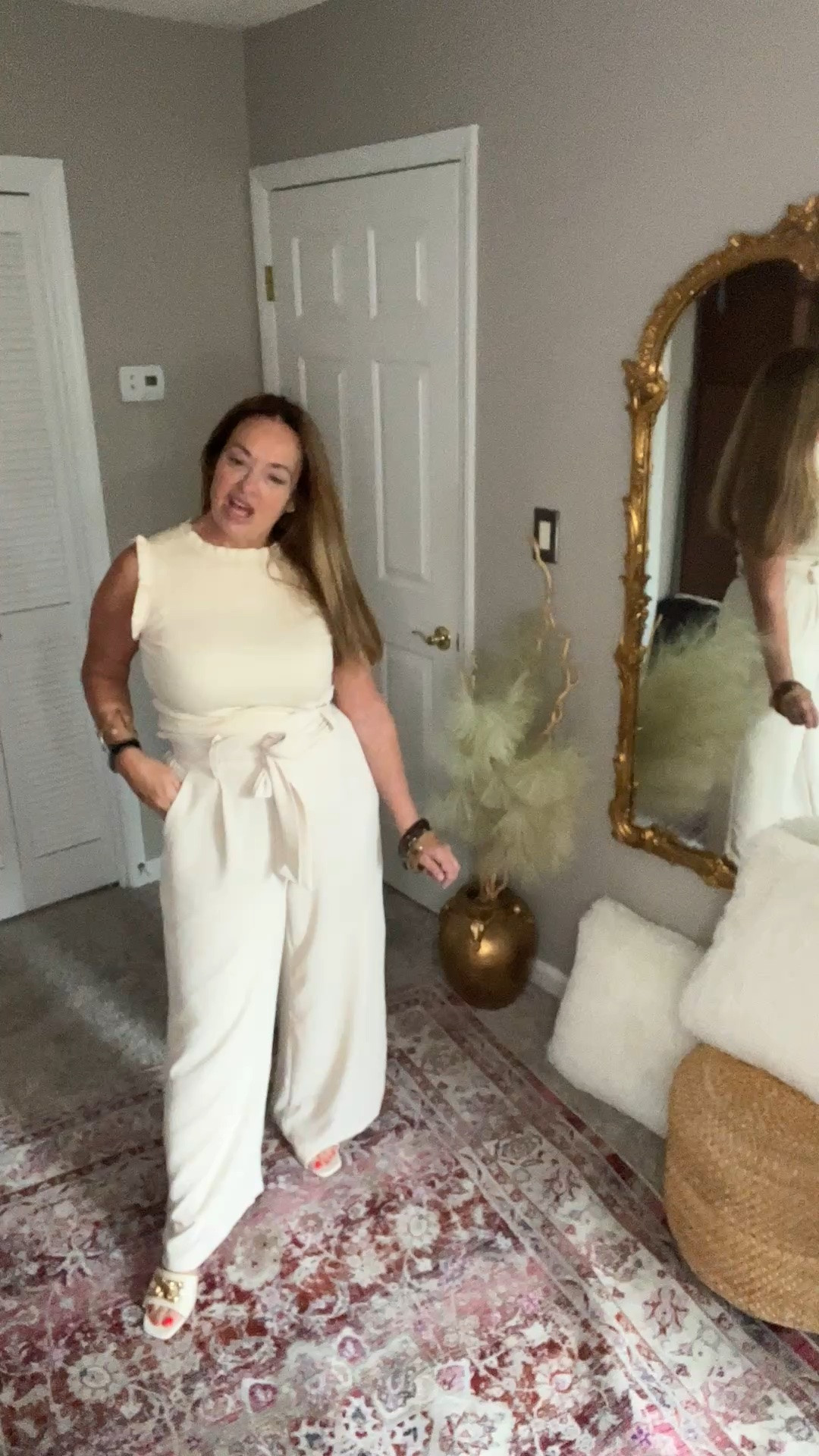 An elegant monochromatic look.
High waist tie palazzo pants and a beautiful ruffle neck and sleeve tank.

Summer work wear that will transfer into the weekend

#LTKgrwm #LTKootd #LTKWorkwear