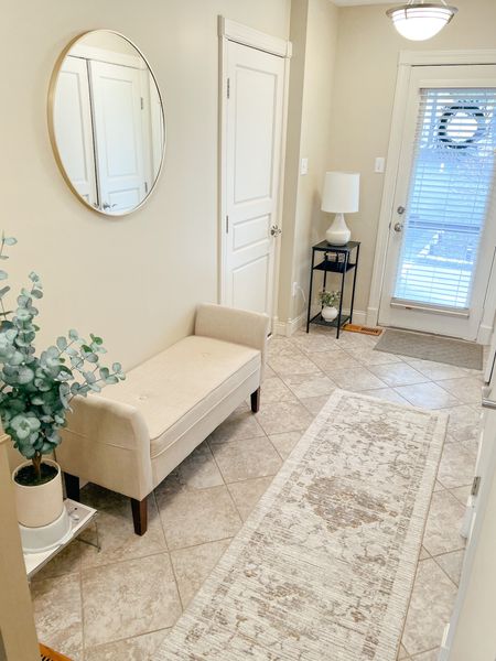 Entryway 
Target. Studio McGee
White upholstered bench
Vintage Threshold Target runner rug
Eucalyptus faux plant
Black small side table
Project 62 lamp
Round gold mirror 

#LTKunder50 #LTKFind #LTKhome