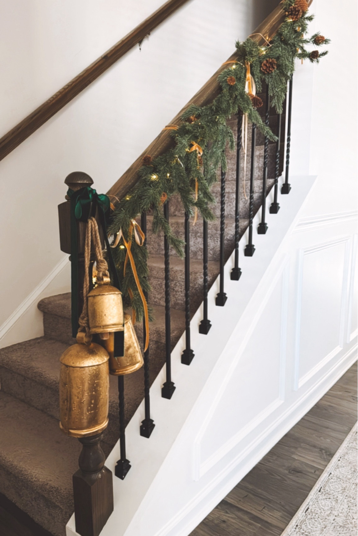 Added christmas bells and ribbon to our stairs this year 🔔🌲

#LTKhome #LTKHoliday #LTKSeasonal